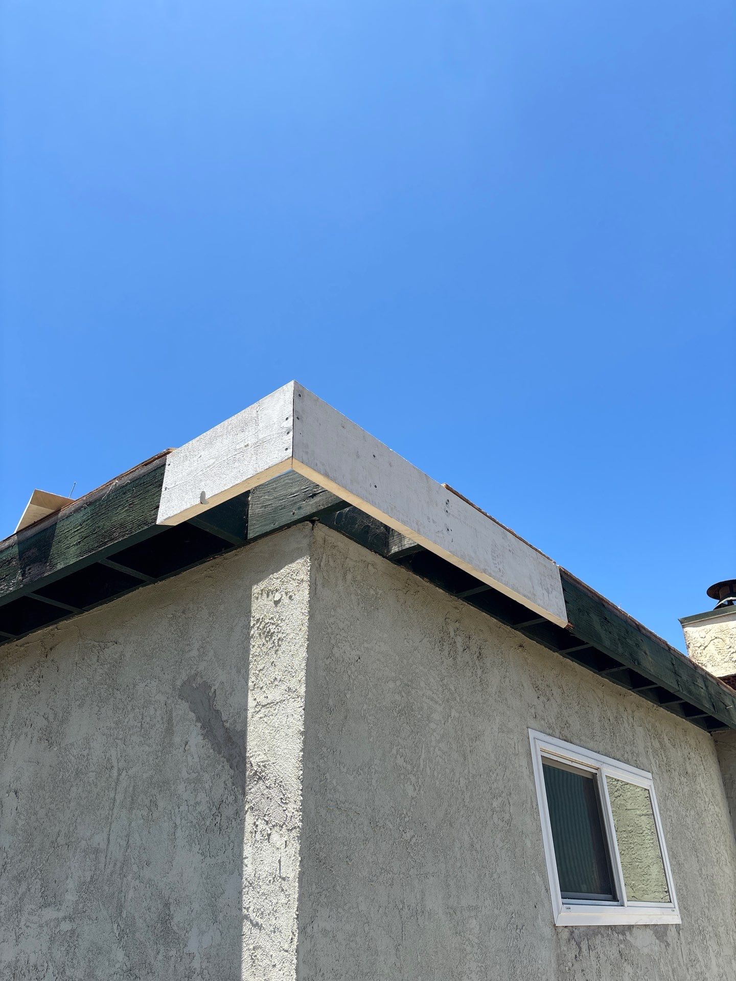 Oceanside Mansard TPO & Shingle Roof Replacement by Zenith Roofing Services