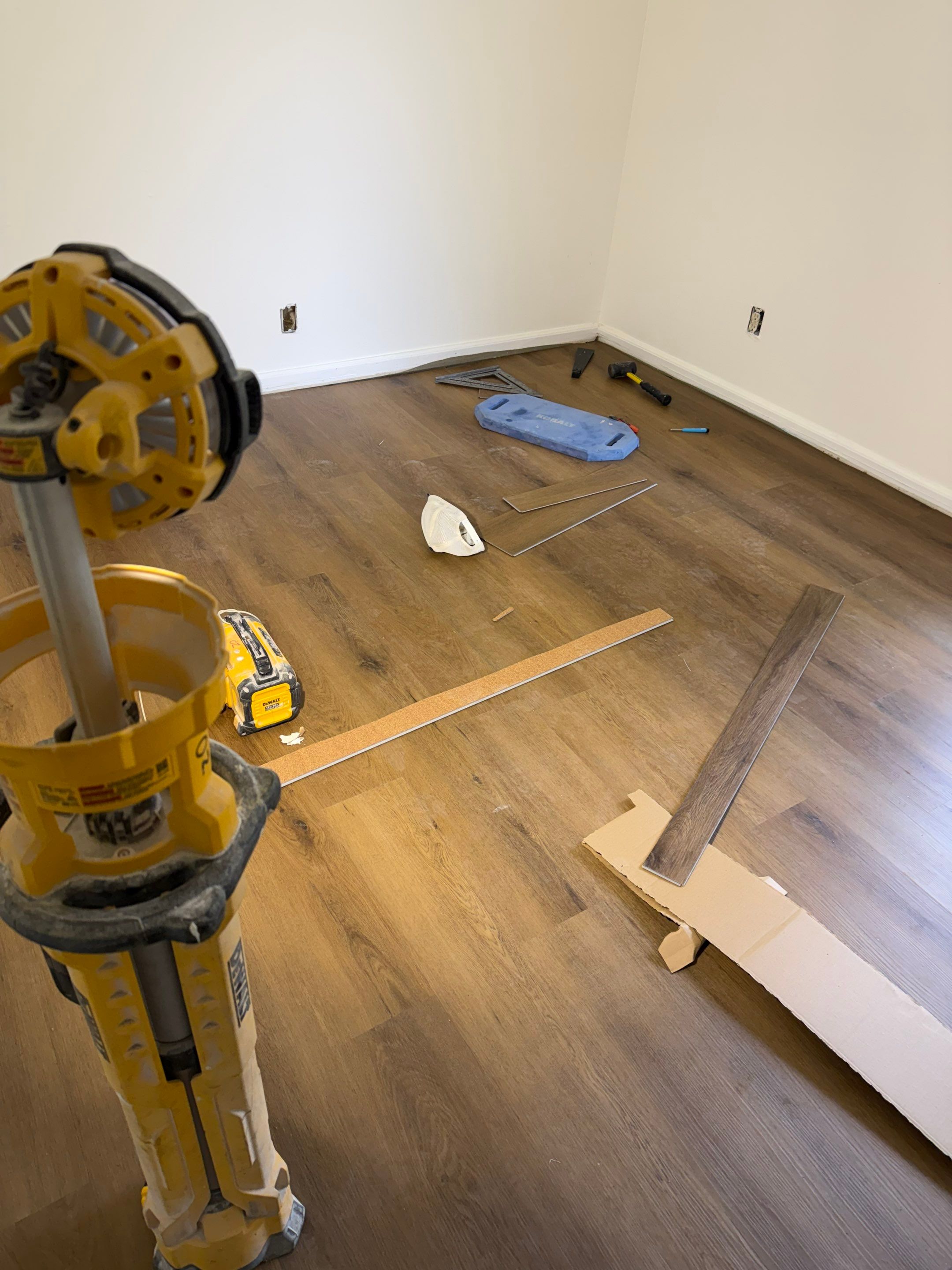 Complete Home Remodel Featuring Custom Kitchen and Wood-Look Plank Flooring by MAJO
