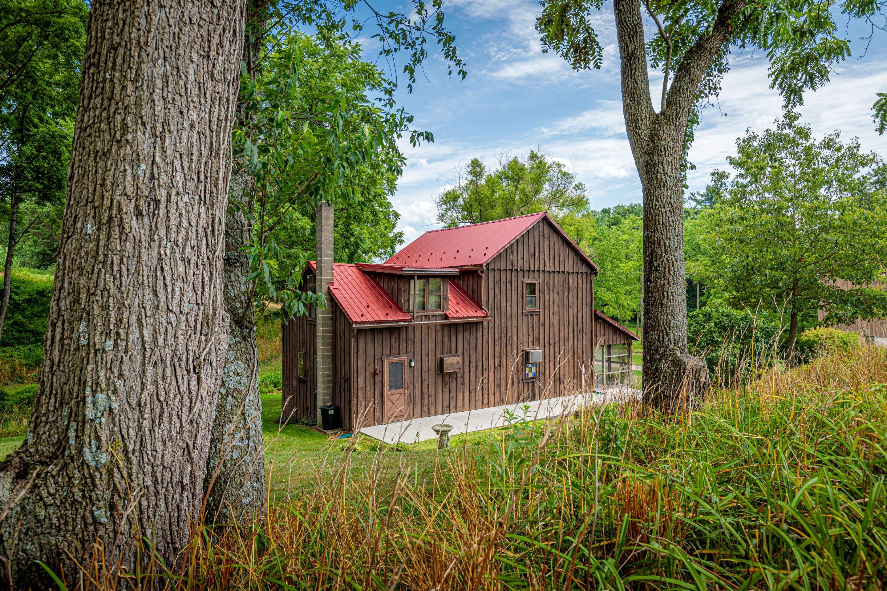 Metal Roof-colonial red by Esh Builders