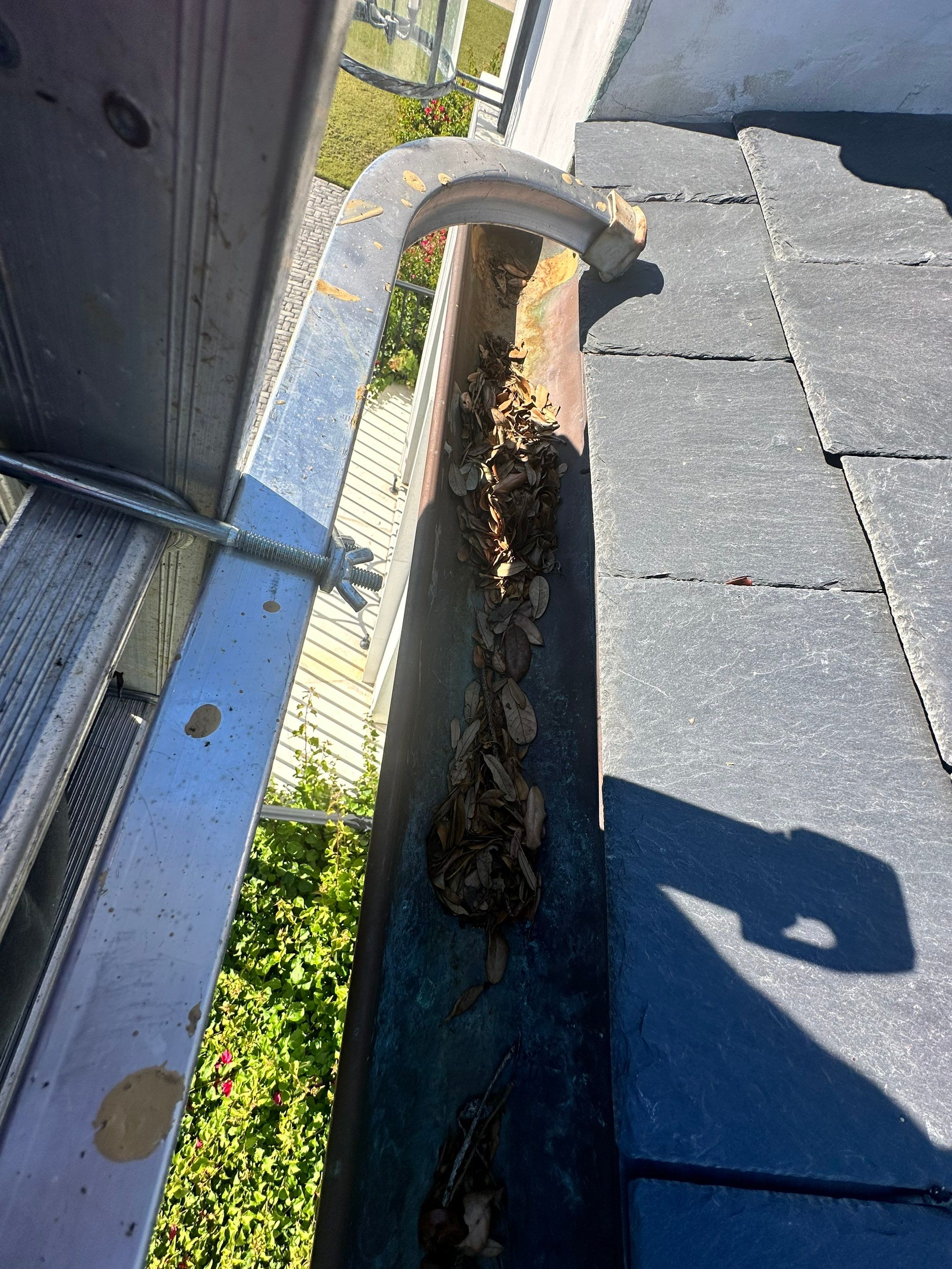 Gutter Cleaning using gutter cleaning in Sarasota FL by Gutter Professors