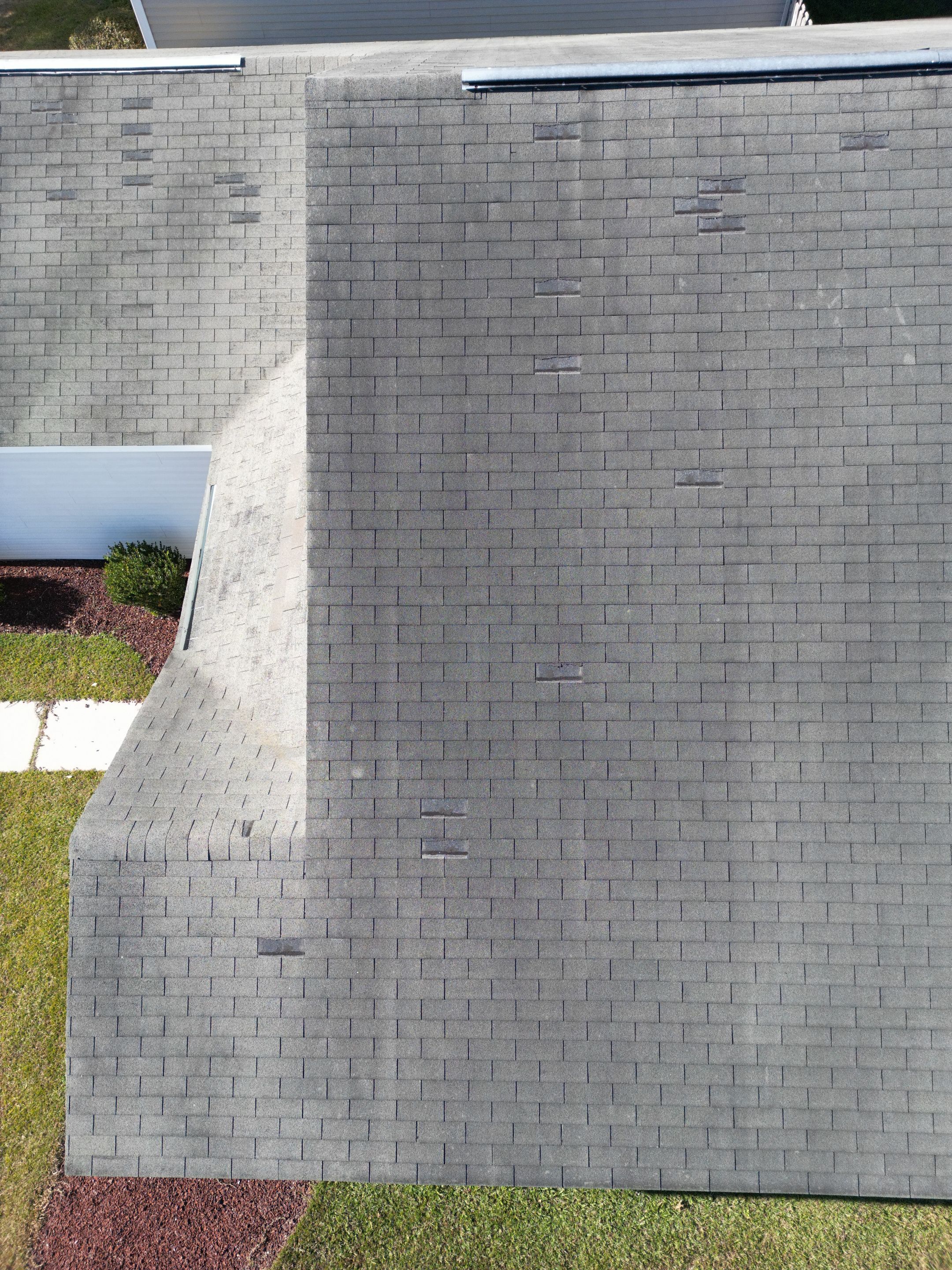 Residential Roofing Installation using Atlas Pinnacle Pristine Black Shadow. by Talya Roofing