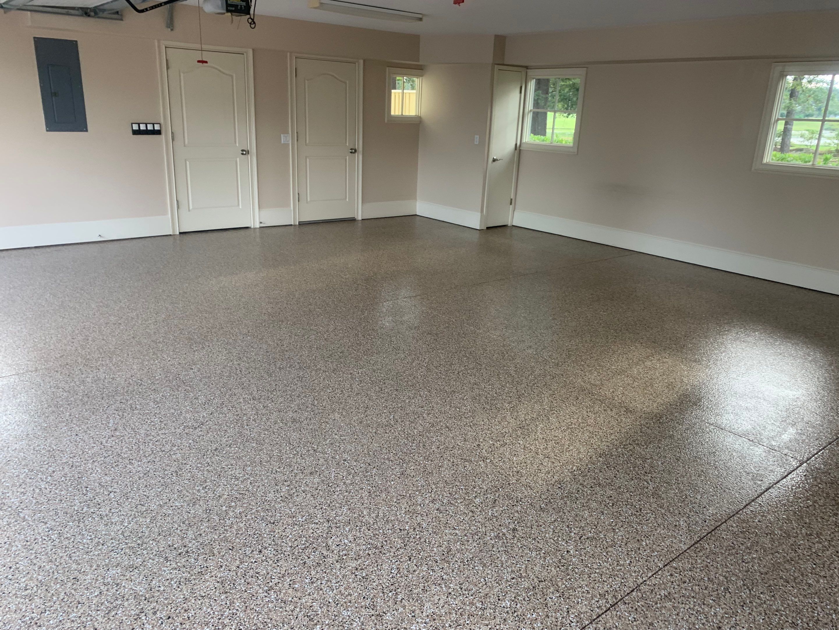 Garage TransFLOORmation using Sandstone by Innovative Concrete Coatings 