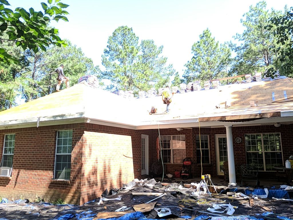 Residential Roofing Installation using Roof Replacement by American Roofing & Construction LLC