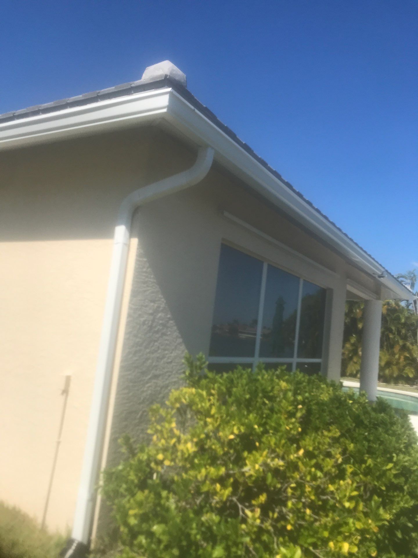 Seamless Gutters using Splash Guard in Cape Coral FL by Gutter Professors