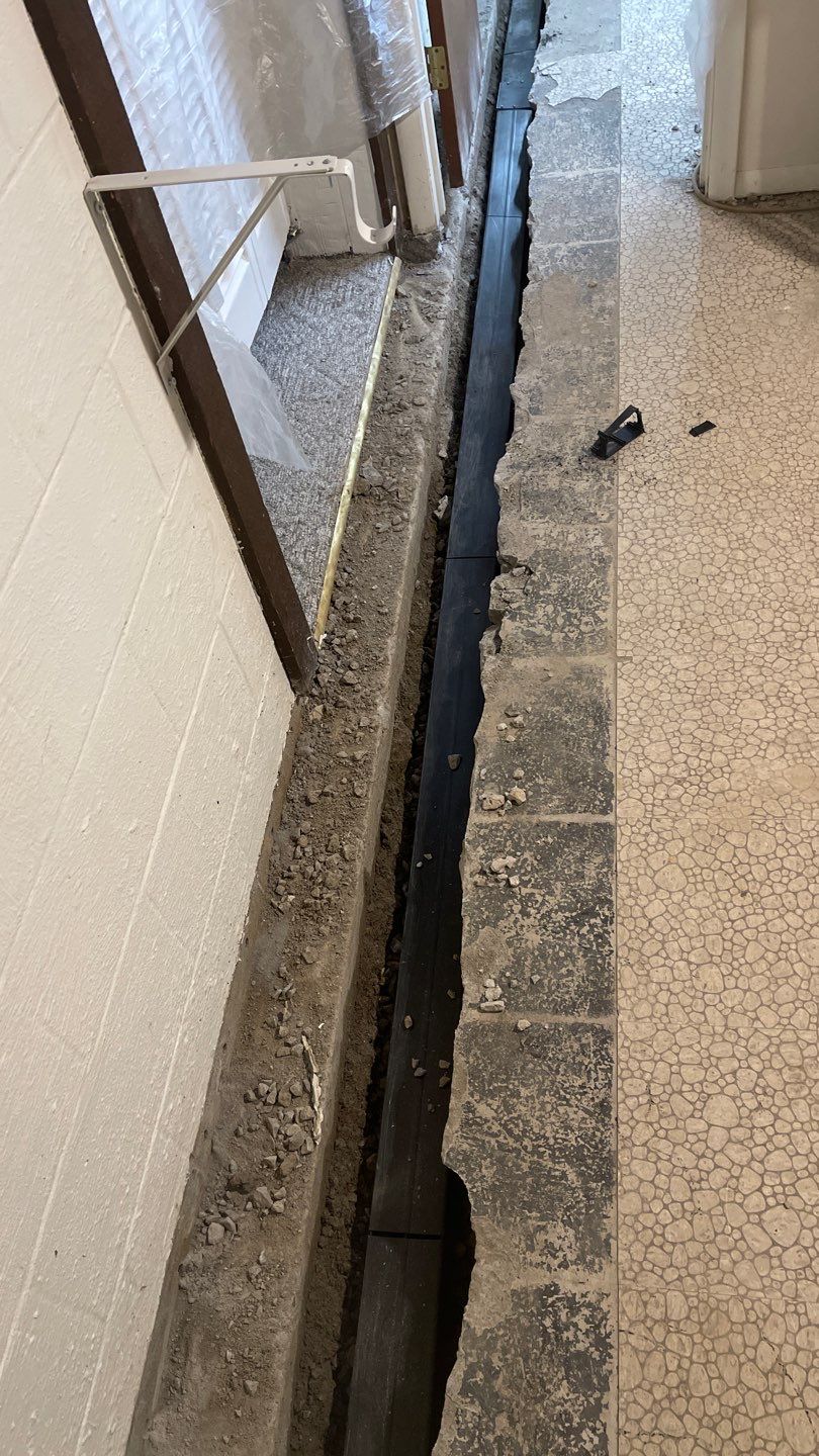 Interior Waterproofing Using GrateDrain™ Products by Toledo Basement Repair