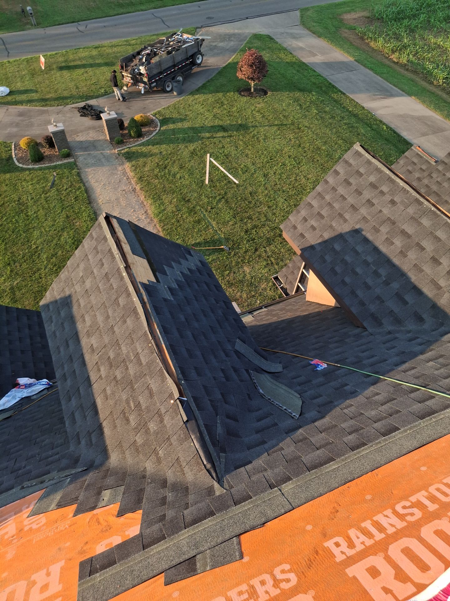 Residential Roofing Installation using GAF Timberline HDZ Charcoal by Rainstoppers Roofing