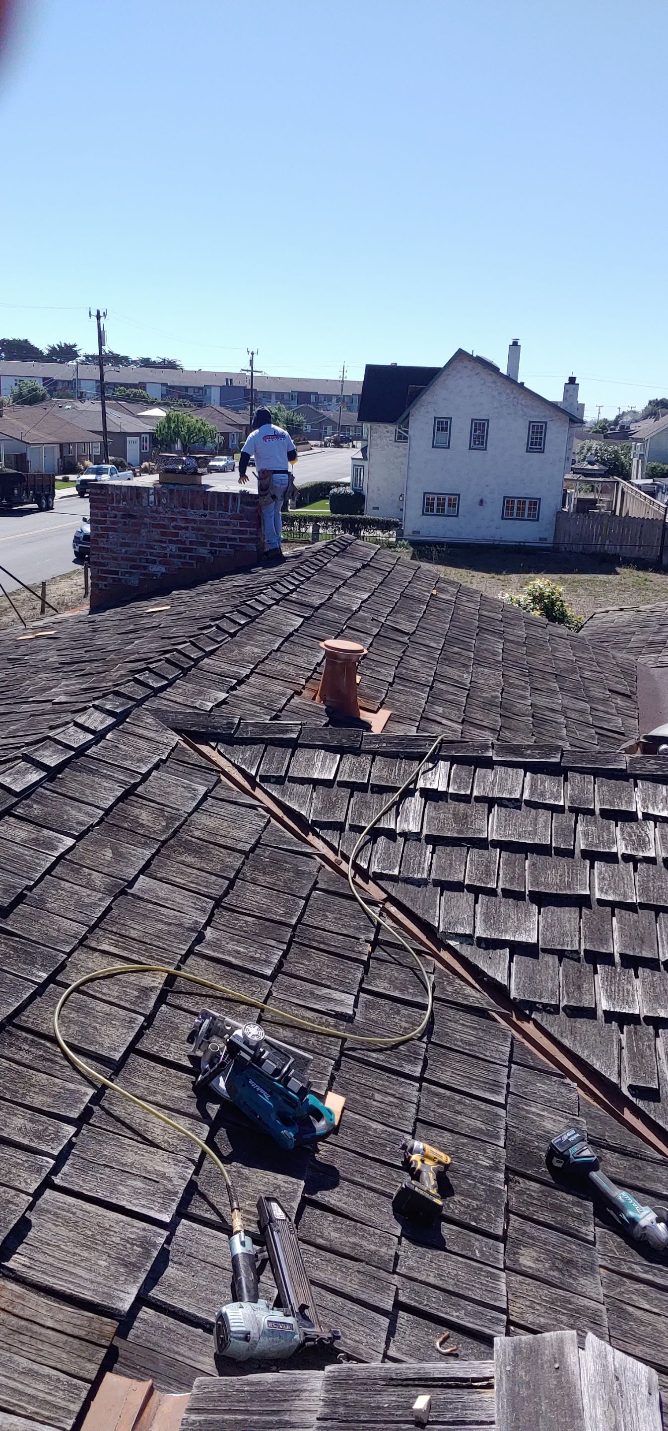 Refurbish and repair shake roof to get ready to sell by Straight Edge Roofing Inc