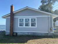Siding Installation using JH Select Cedarmill Eased Edge by ExteriorPros