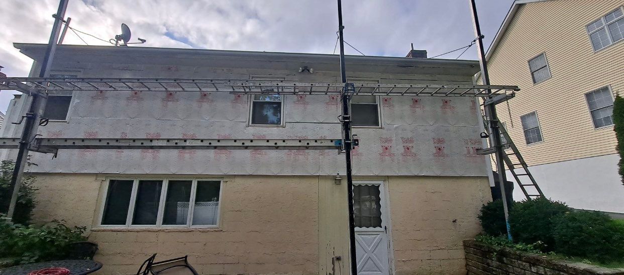 Siding Installation using CertainTeed monogram 4" double 4 Charcoal Gray by A Plus Exterior