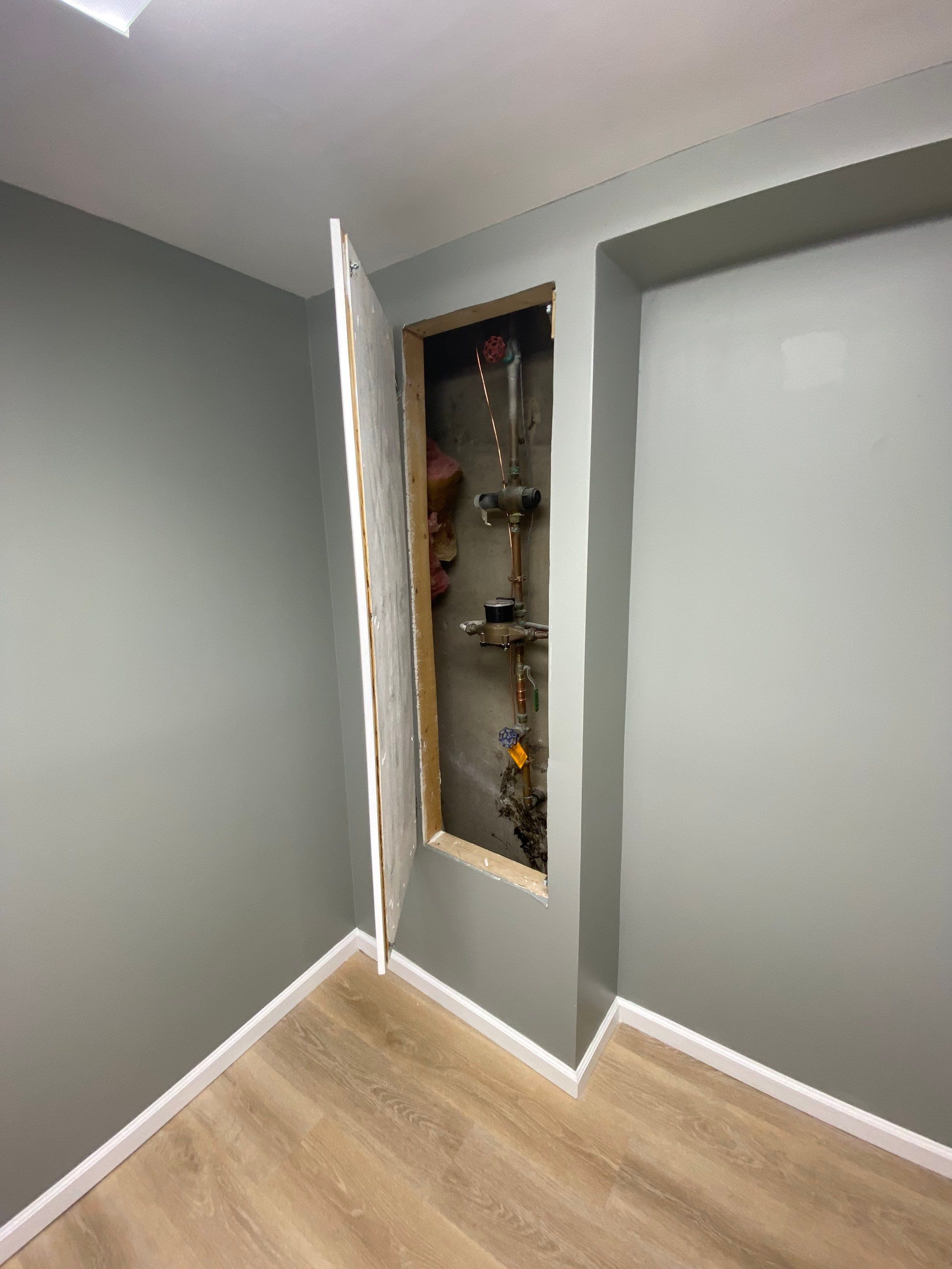Laundry Room Redmodel using Lifeproof Luxury Vinyl Plank Flooring by The Smet Companies, LLC