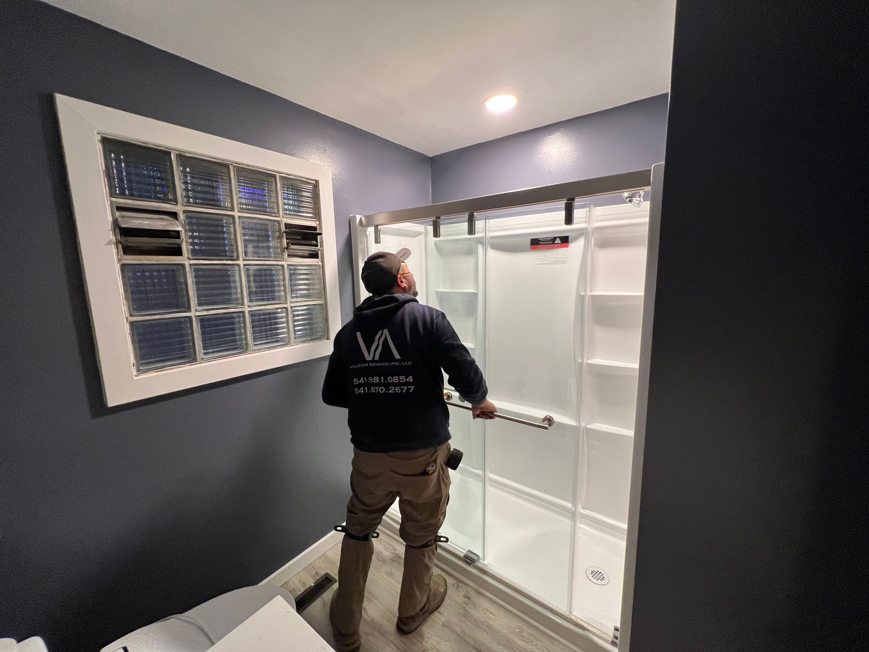 Bathroom Remodel using Shower Kit by Villegas Remodeling, LLC
