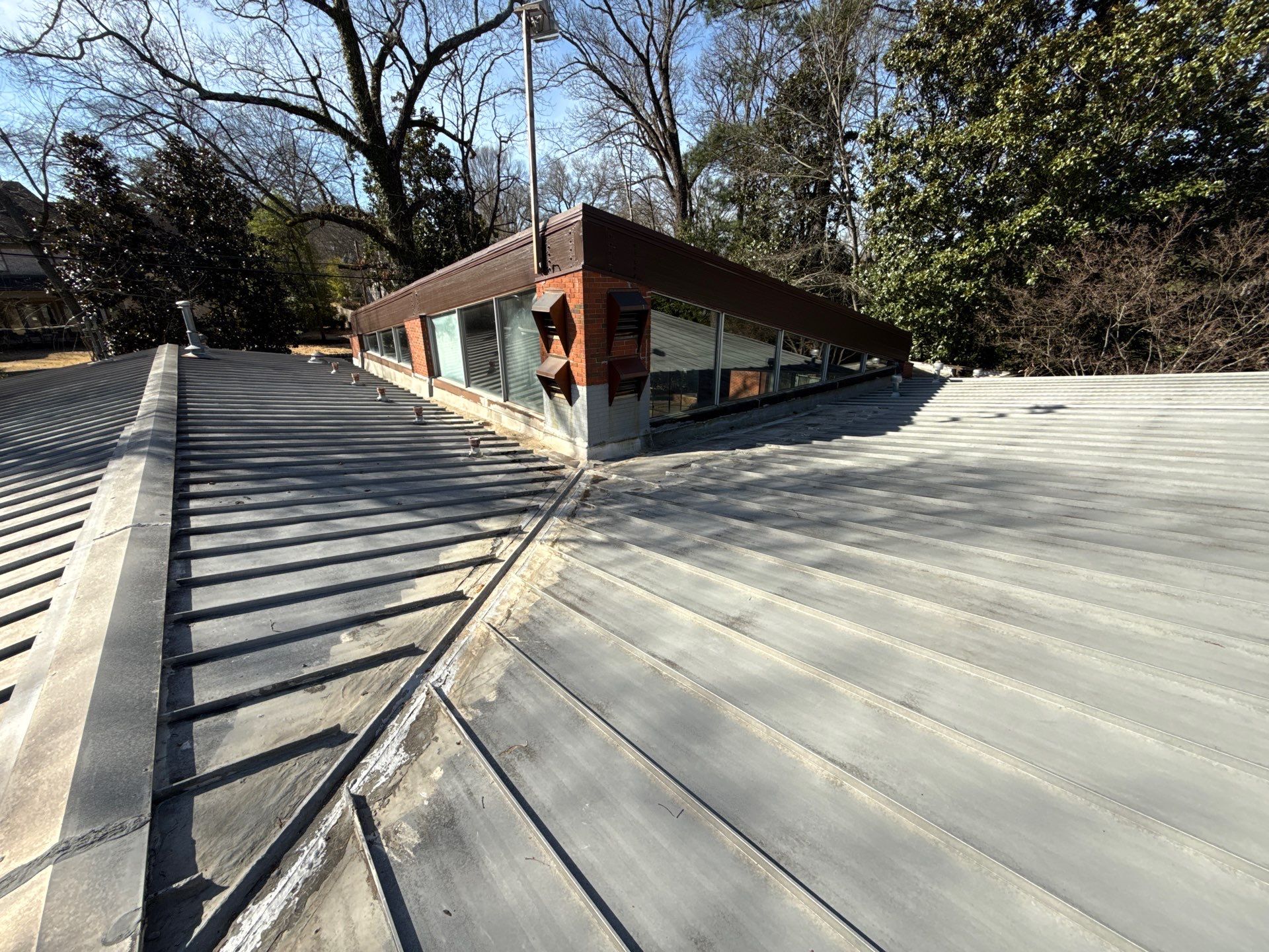Residential Standing Seam Metal Roof and Membrane Replacement in Memphis by Revival Roofing Services