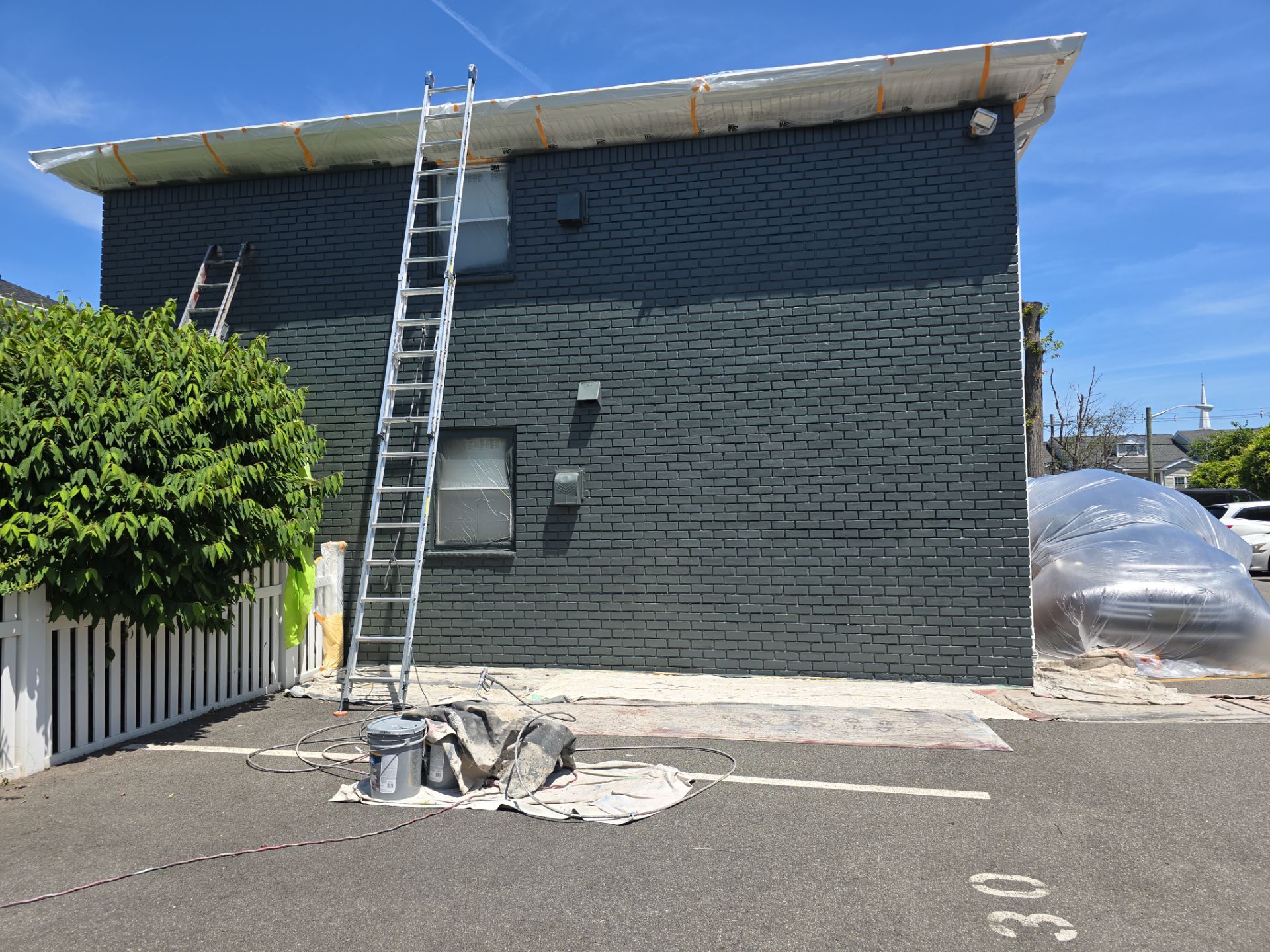 Multi-Unit Apartment Complex Exterior Brick Painting Project in Hackensack by Spectrum Painting, LLC