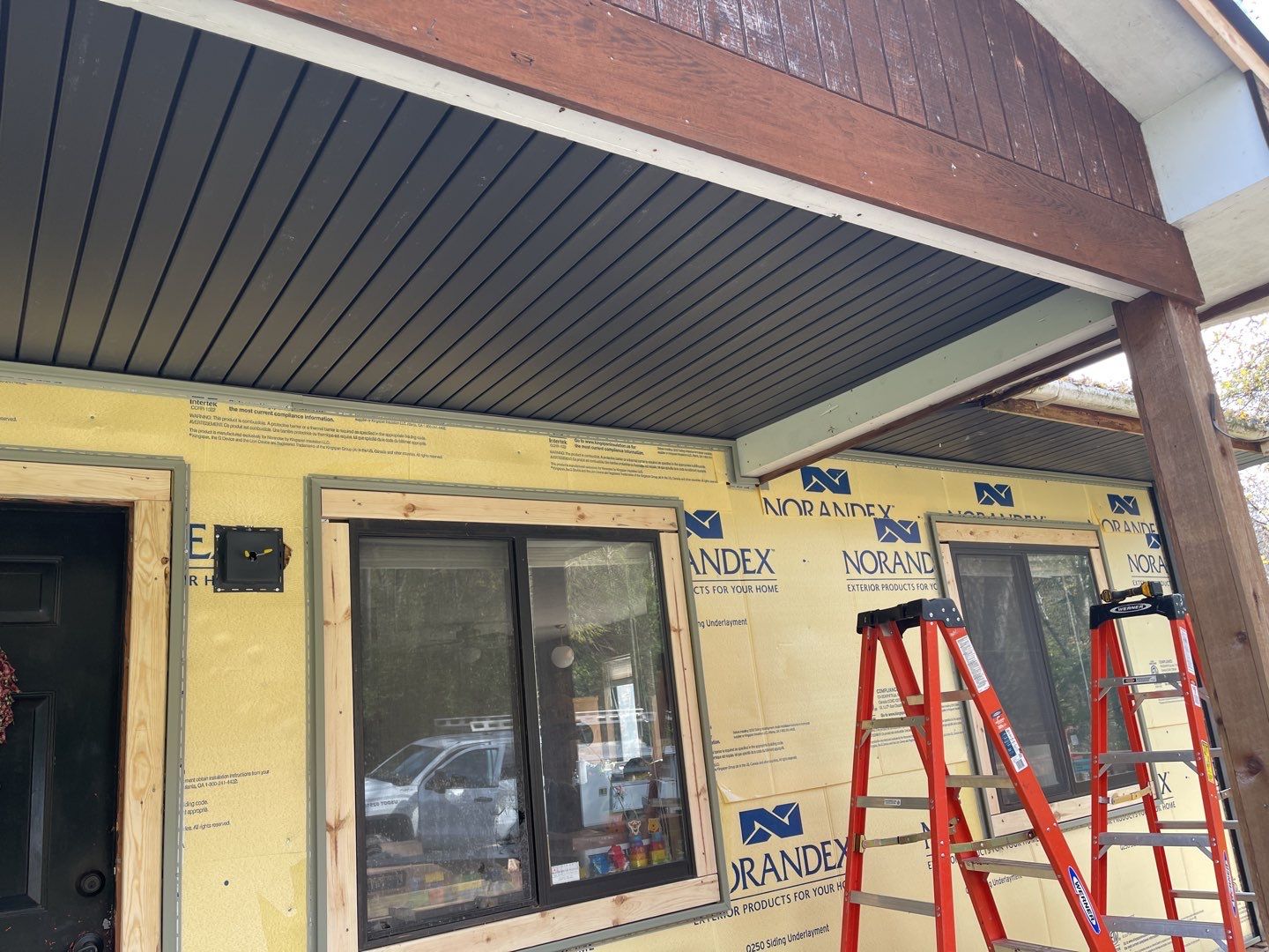 Metal Roof and Vinyl Siding, Soffit, Gutters using LifeTite Premium metal roofing  by Secure Construction Company Inc