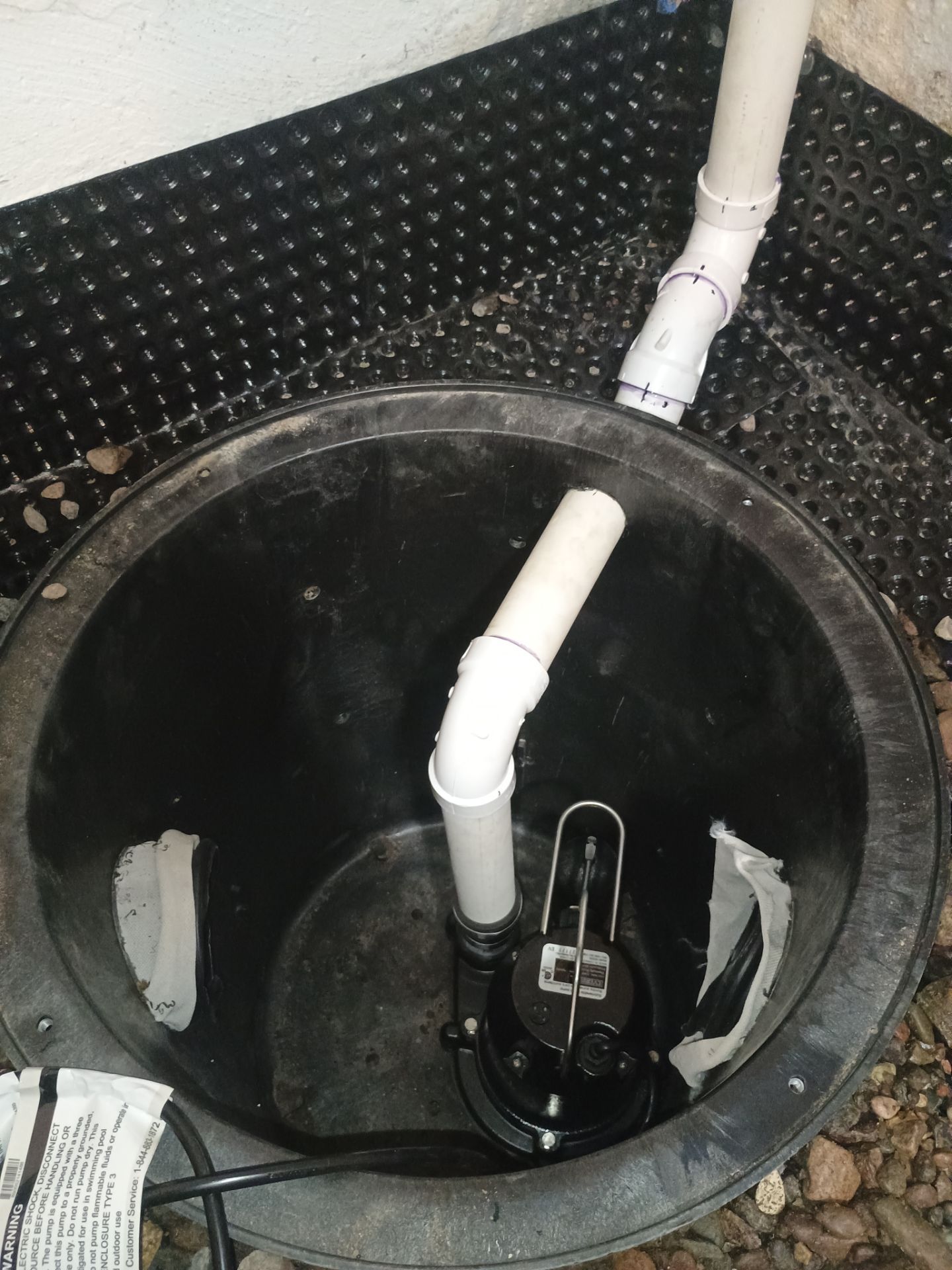 Sump Pump & Buried Discharge in Northeast Minneapolis by Waterproofing Northeast
