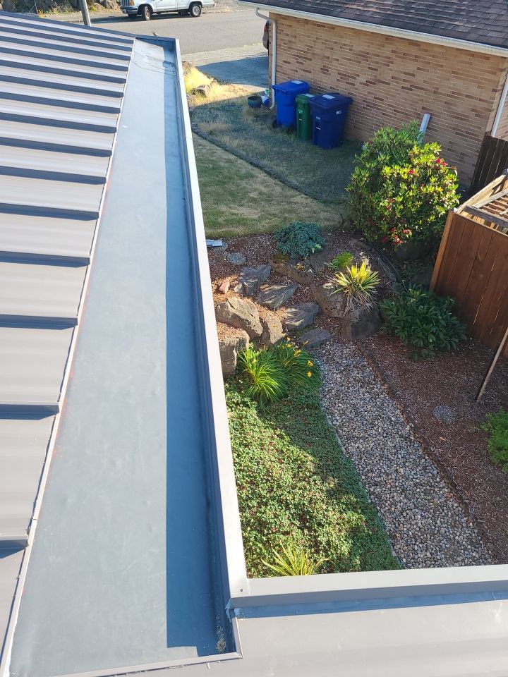 Low Slope Shingles to Metal with Built in Gutters by Roof Smart