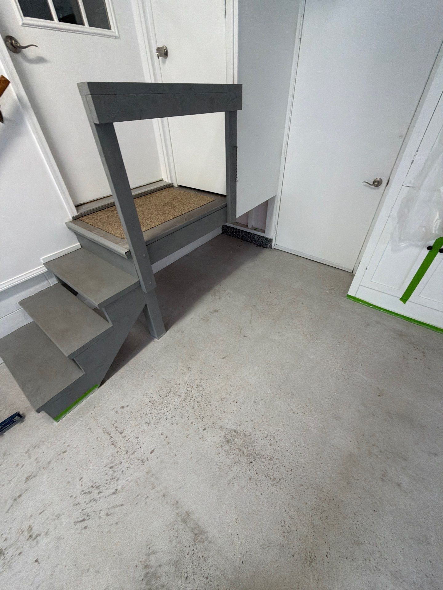 Pentwater Garage Epoxy Flake Floor Installation and Exterior Refinement by Gordon Painting