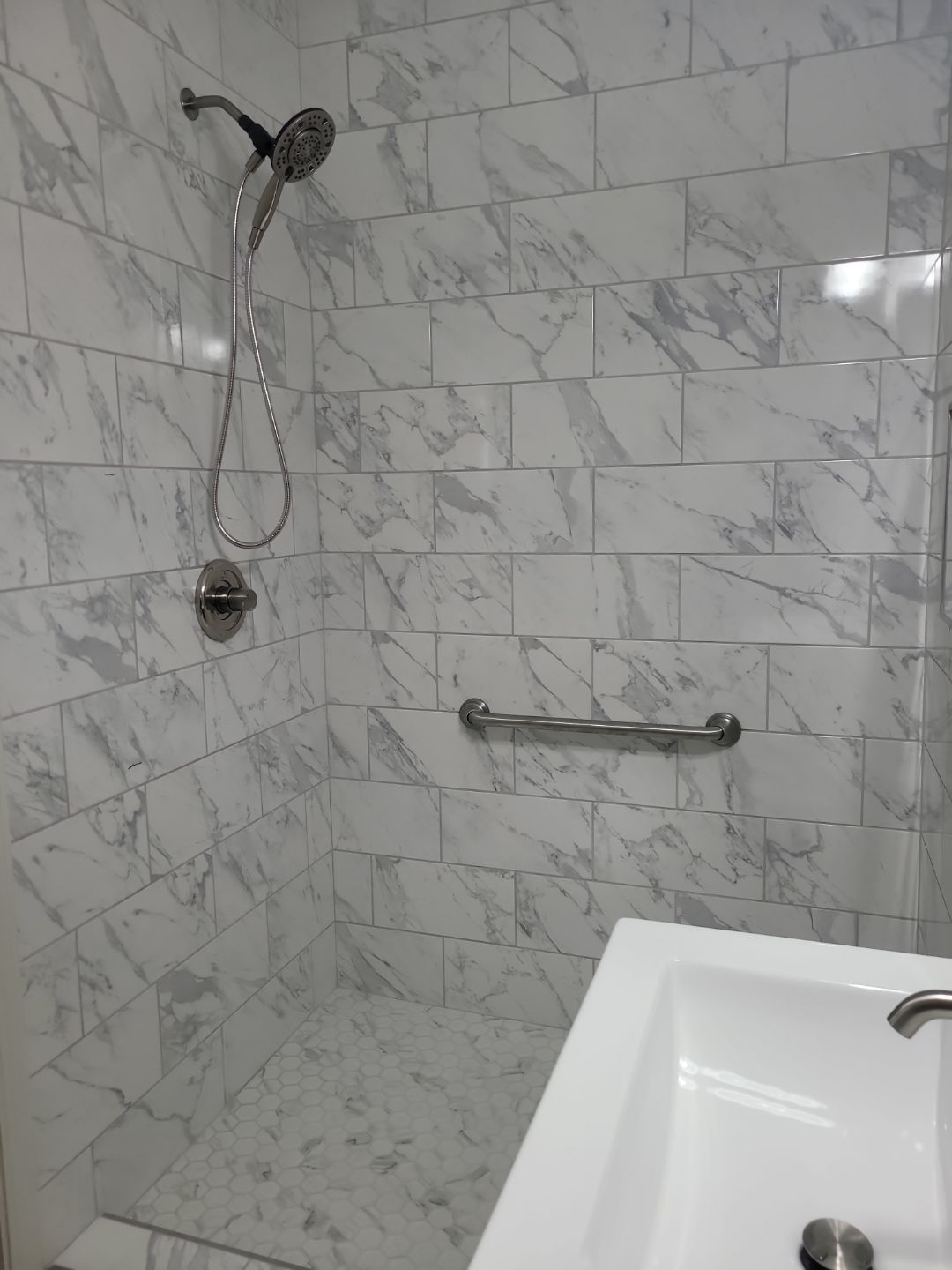 A Pathway to Possibility – Turning a Half Bath into a Full Retreat in Holly Springs by Elite Remodeling and Design LLC