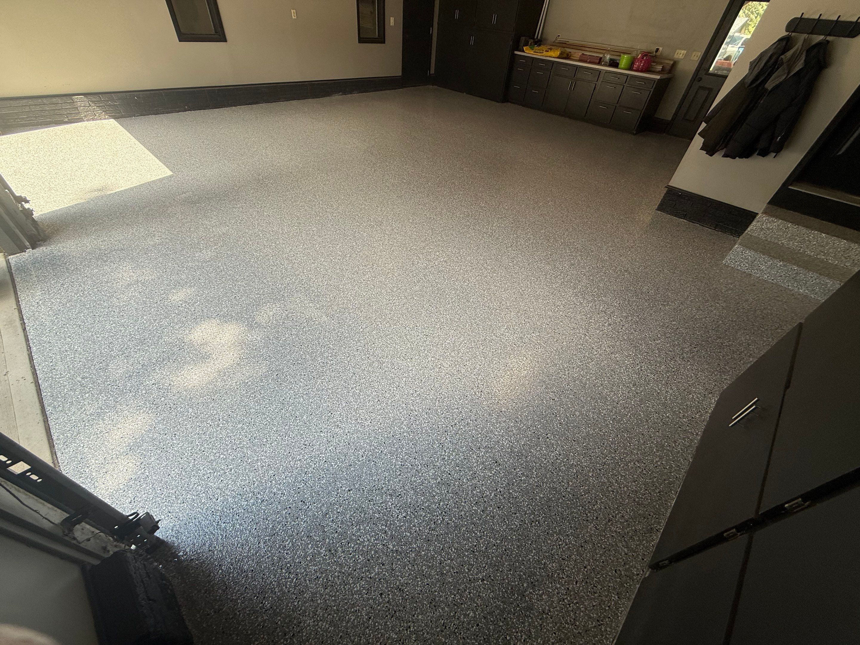 Garage Floor and Textured Pool Deck Coating in Sioux Falls by Select Painting, Coatings & Garage Cabinets