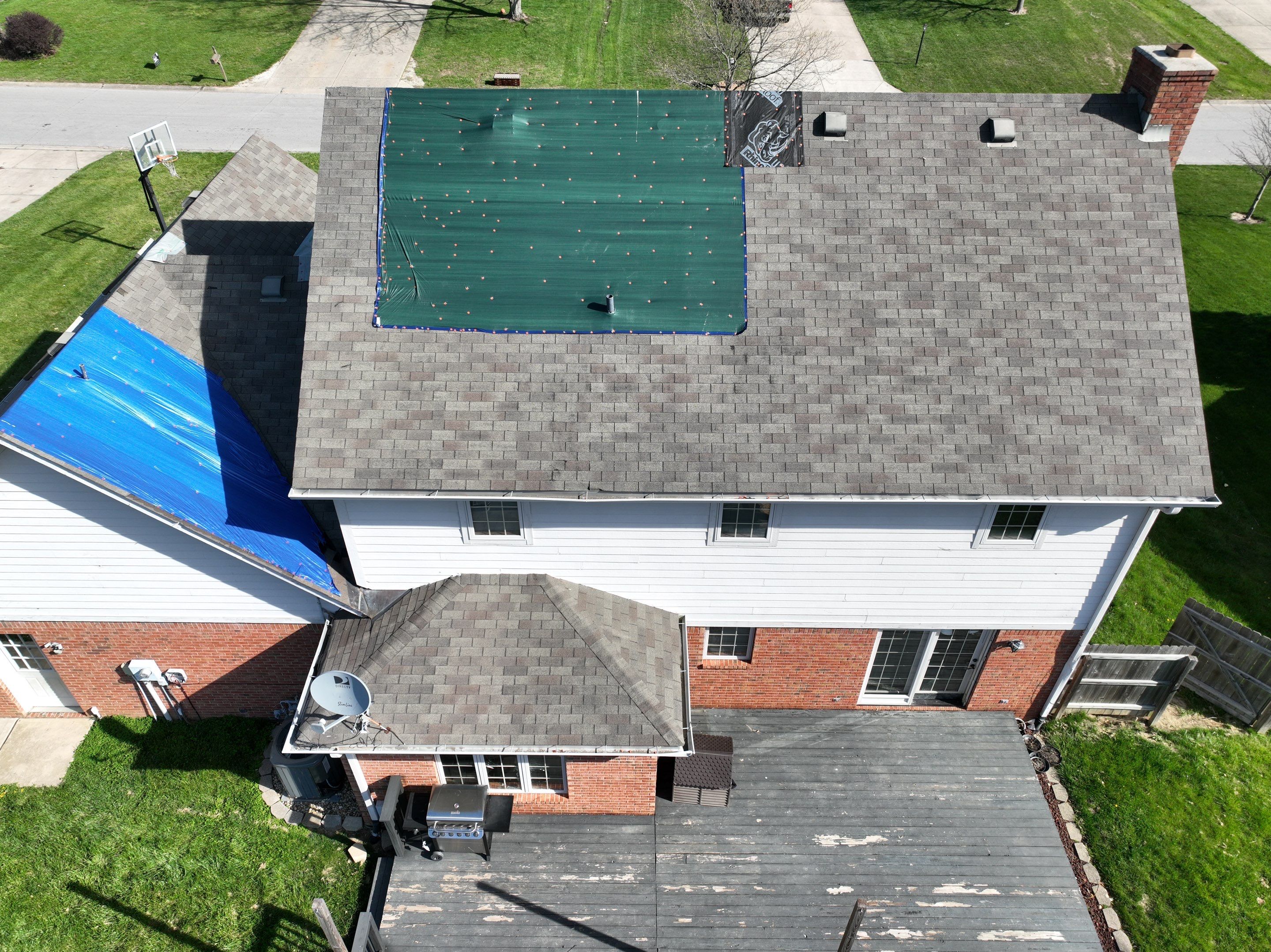 Tornado damage in Whiteland. Roof replacement, James Hardie siding, exterior paint, gutters, windows, doors by 317 Roofing & Restorations