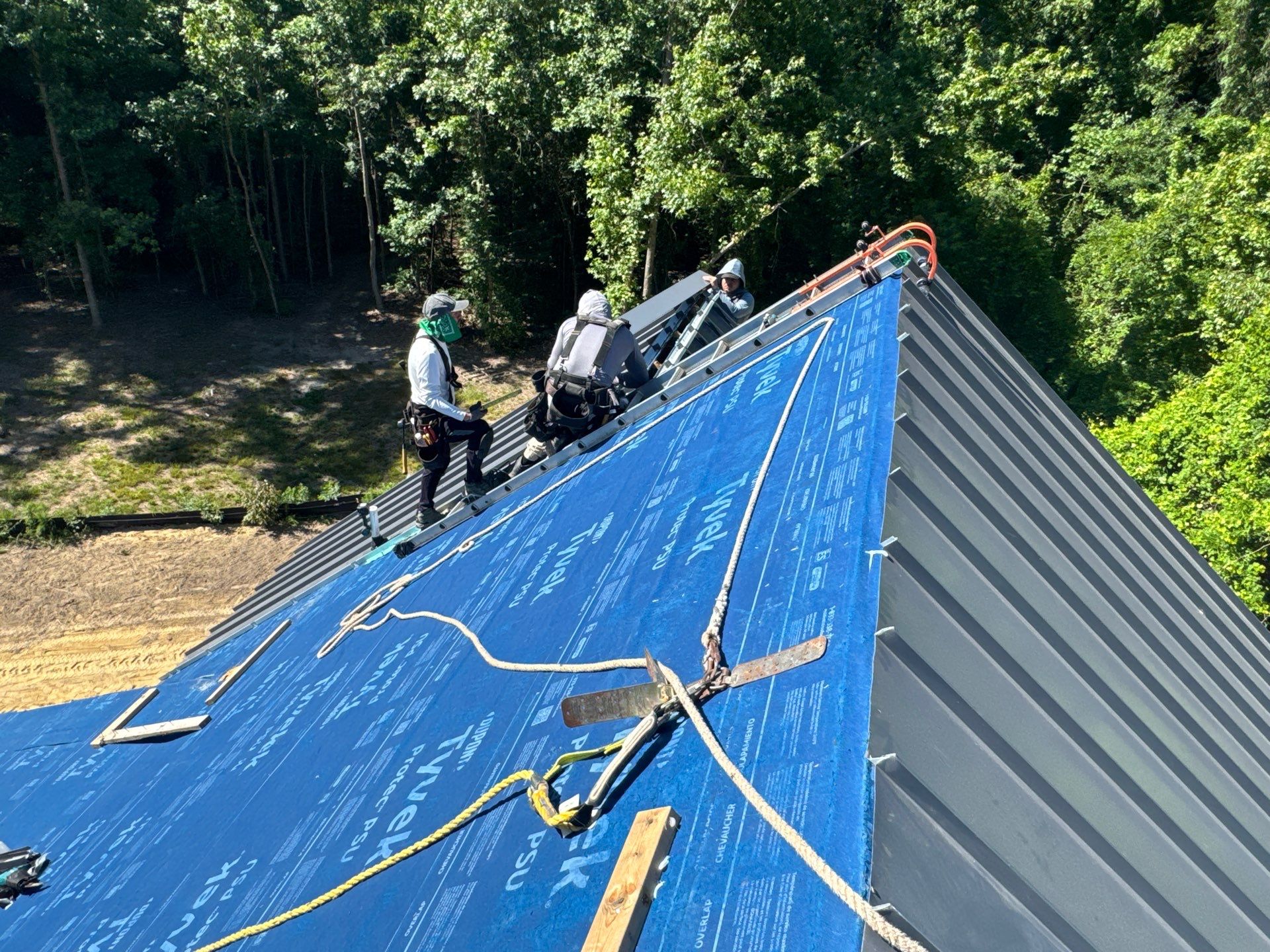 Custom New Construction Home Featuring Standing Seam Metal Roofing in Port Haywood by Cade Construction