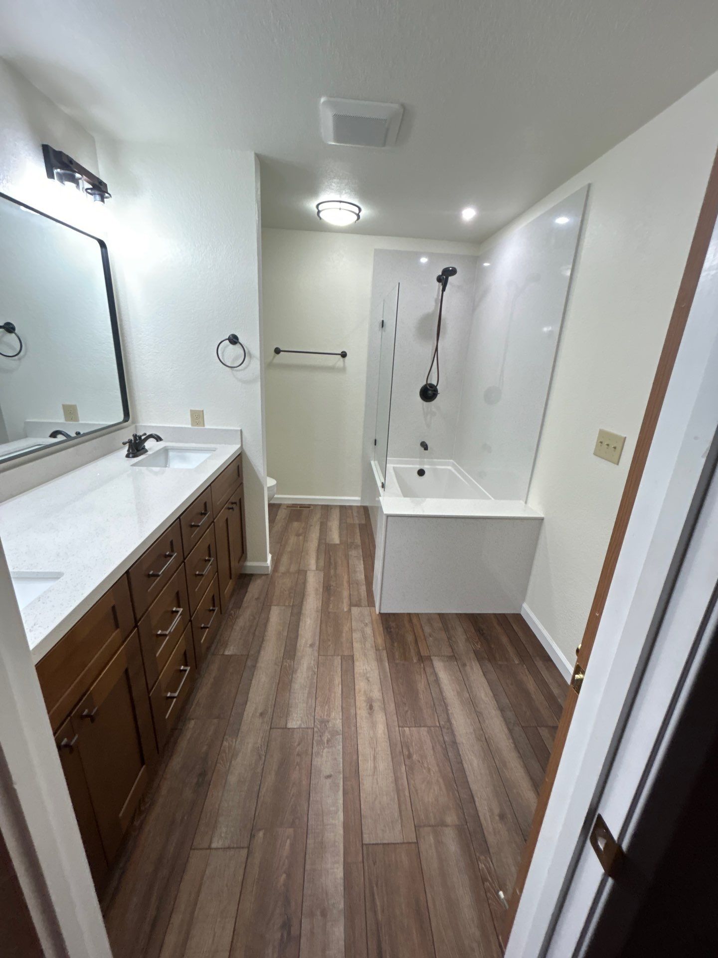 Bathroom Remodel with Double Vanity and Quartz Counters in Vacaville by H4H Remodeling and Repairs Inc.