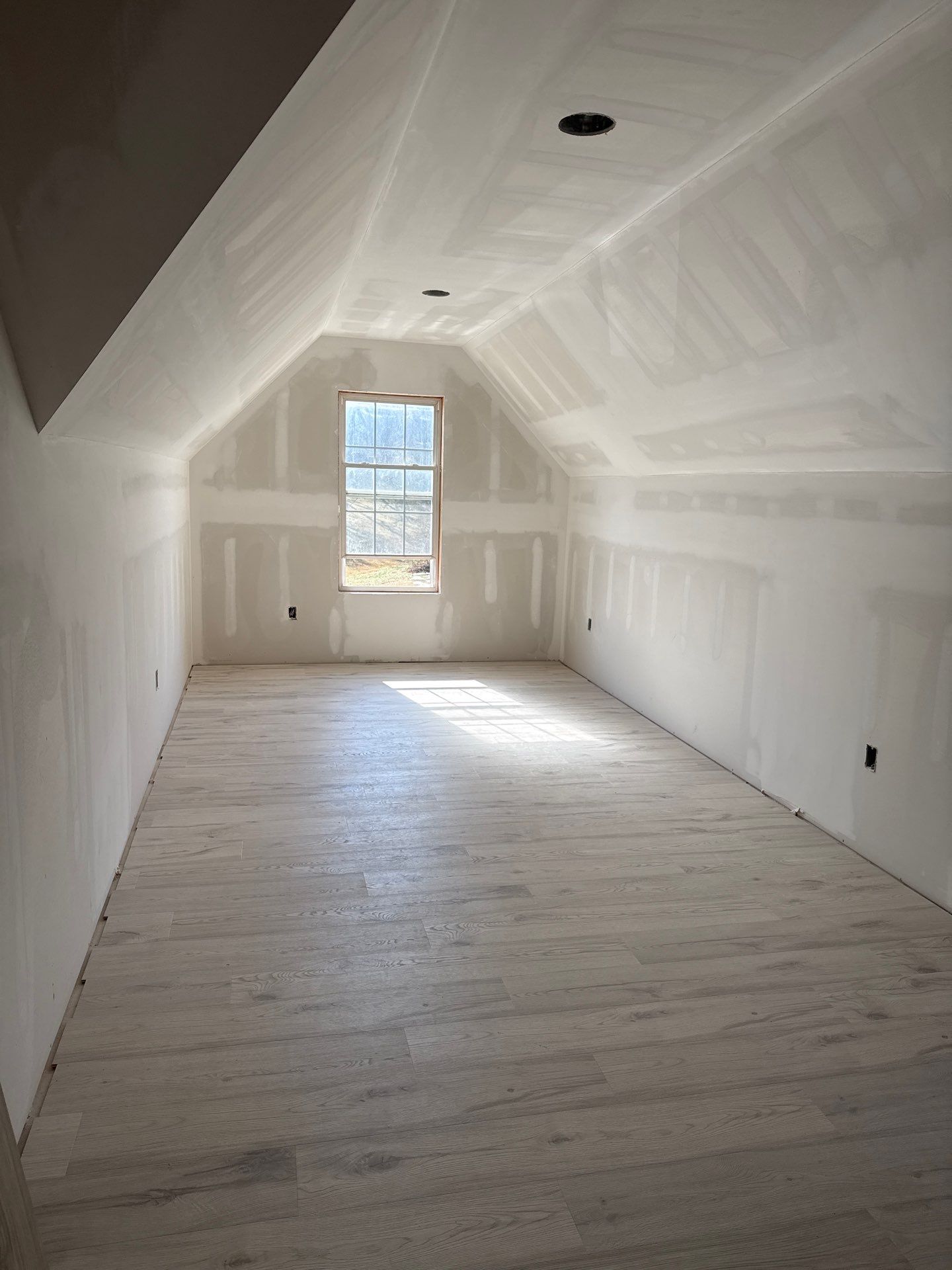 Attic Conversion by Skilled Construction LLC
