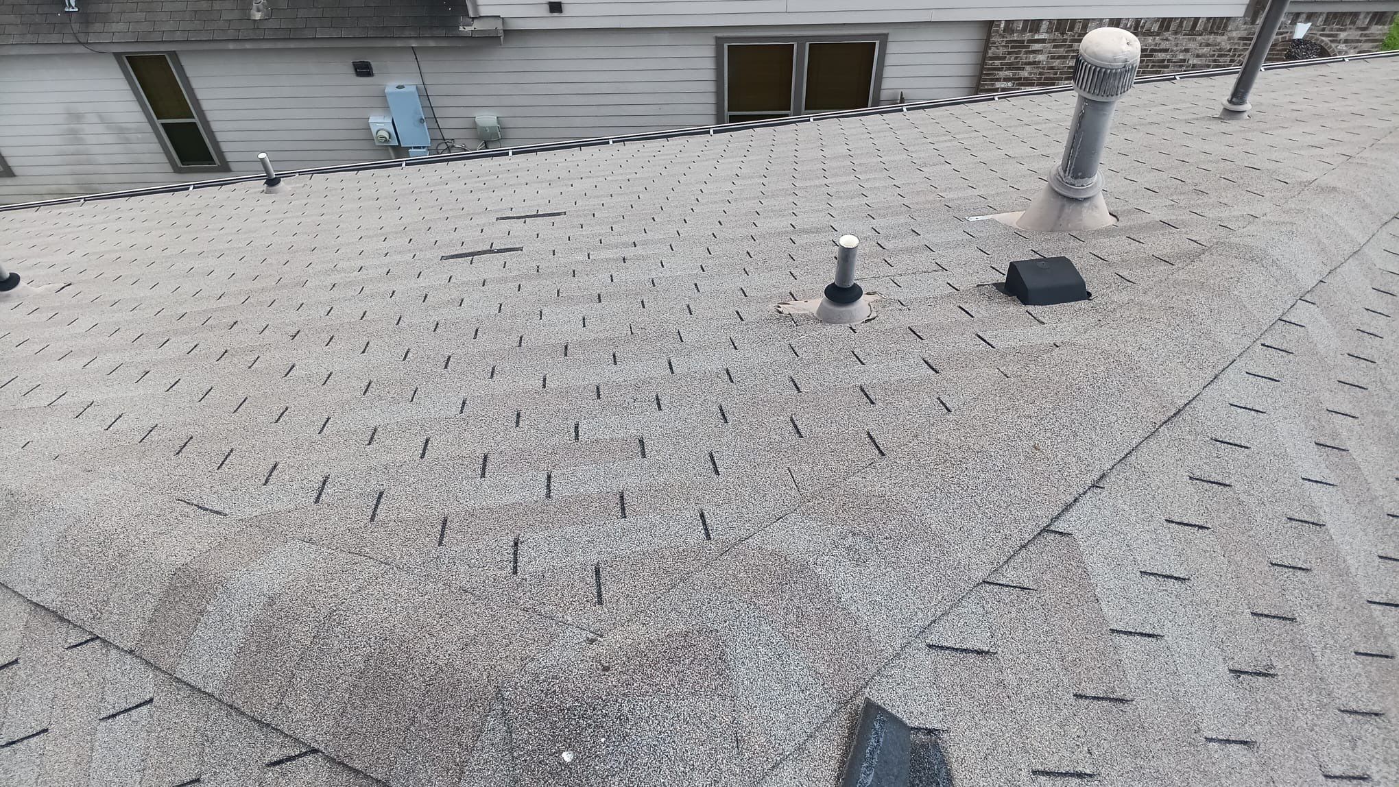 Hail Damage using Owen's Corning Duration (Lifetime) Shingles by Roof Repair Company