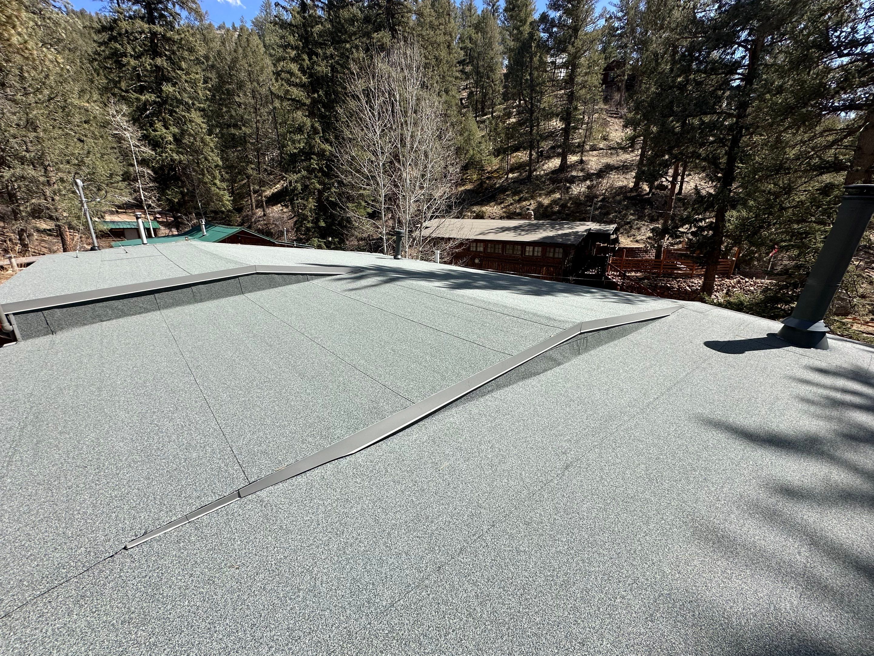 Residential Roofing Installation using Modified Bitumen Roofing by Blue Peaks Roofing LLC 