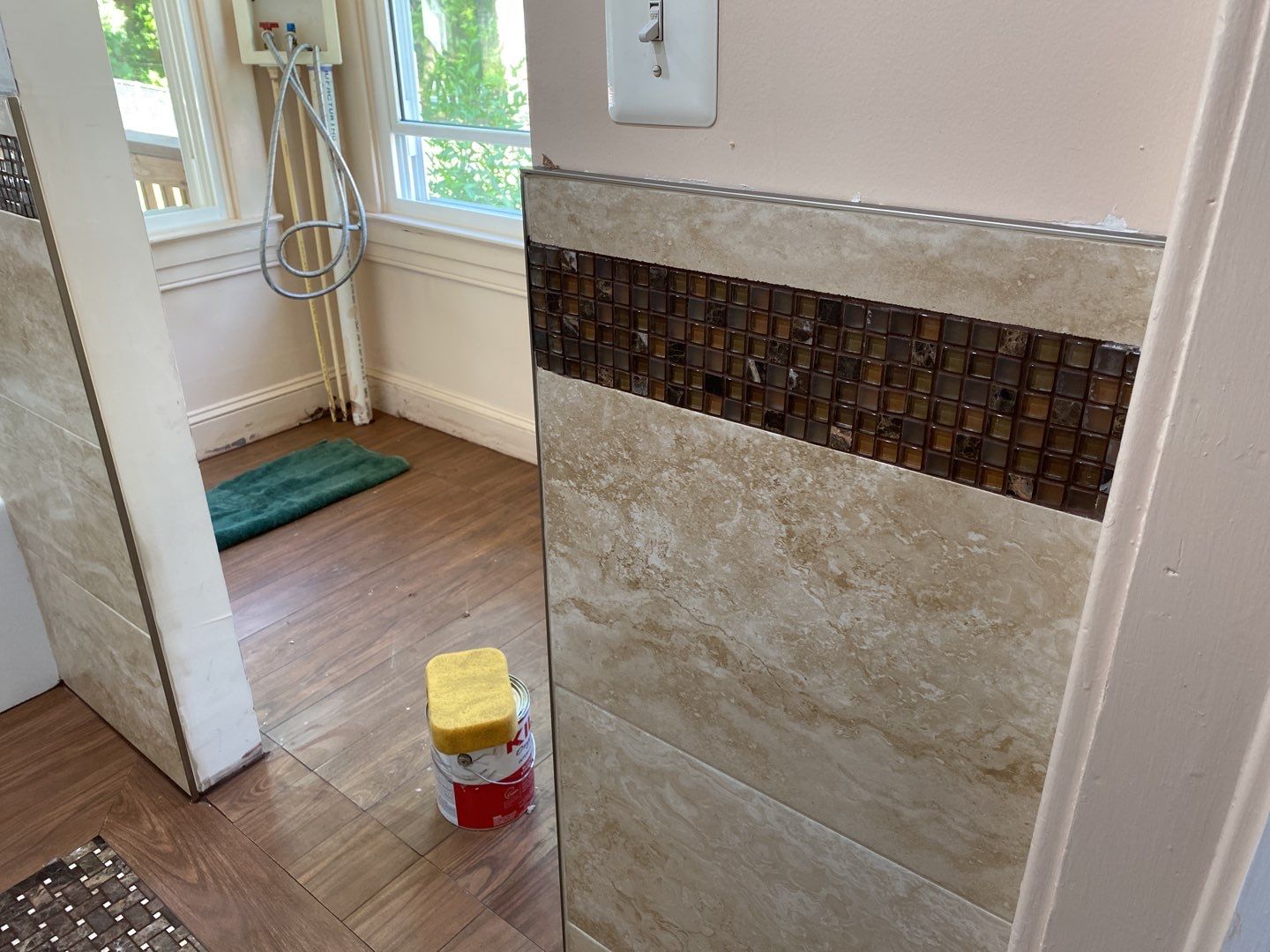 Bathroom Remodel using New Bathroom Tile and Tube by Alpha Design Services