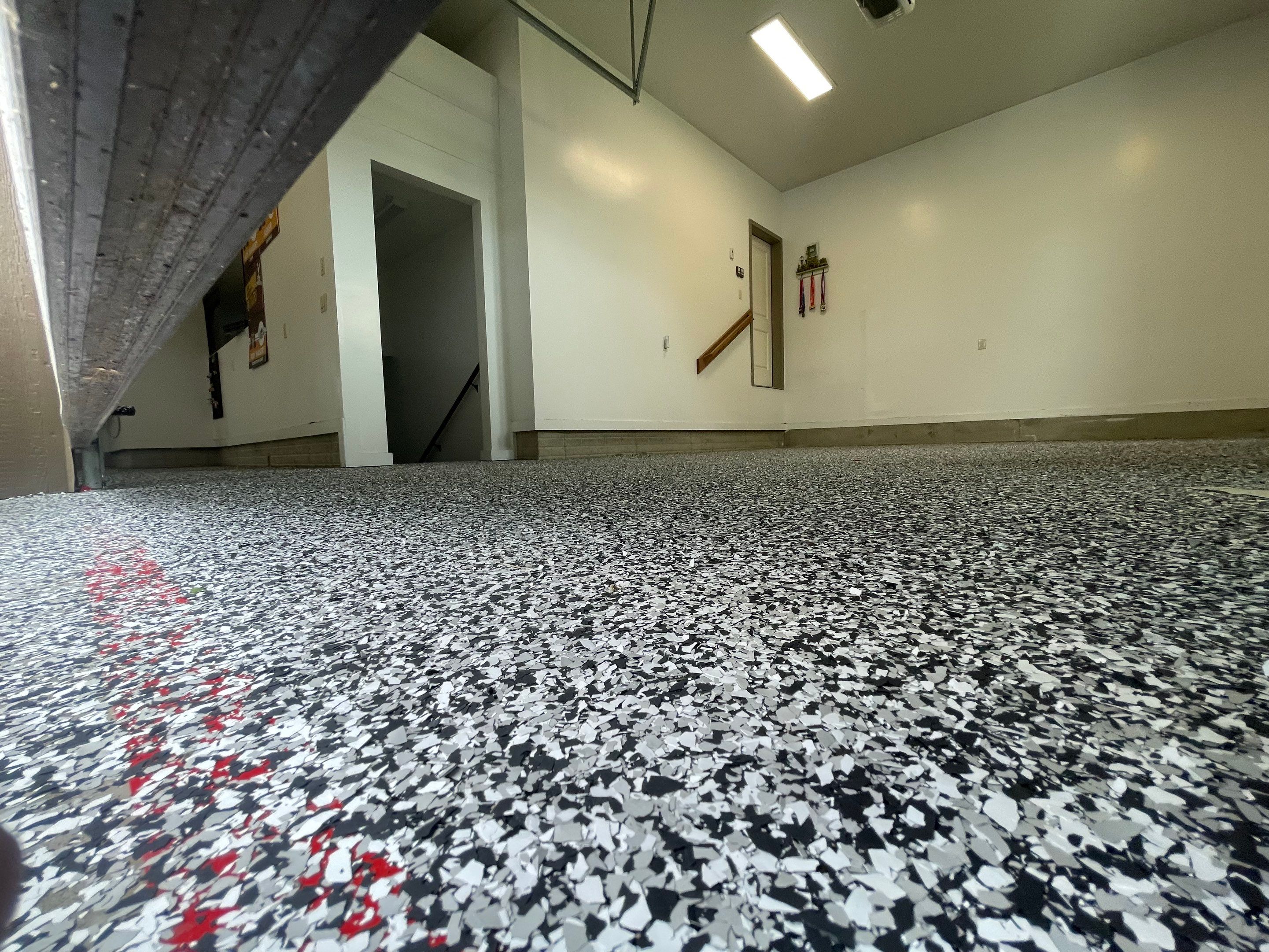 Garage Floor Coating and Domino Flake Finish in Sioux Falls by Select Painting, Coatings & Garage Cabinets