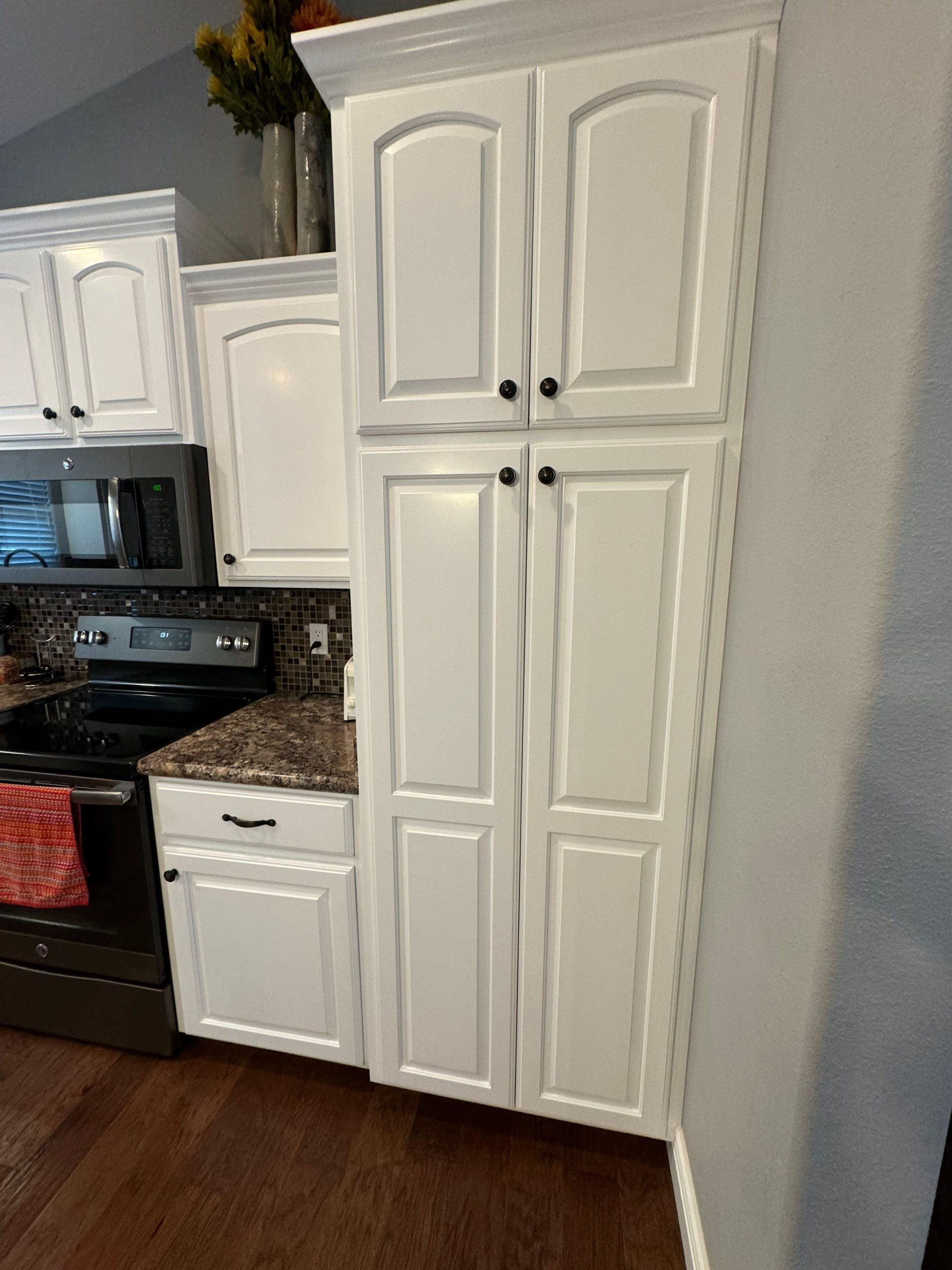 Cabinet Repaint off S Country Club by Pezley Painting
