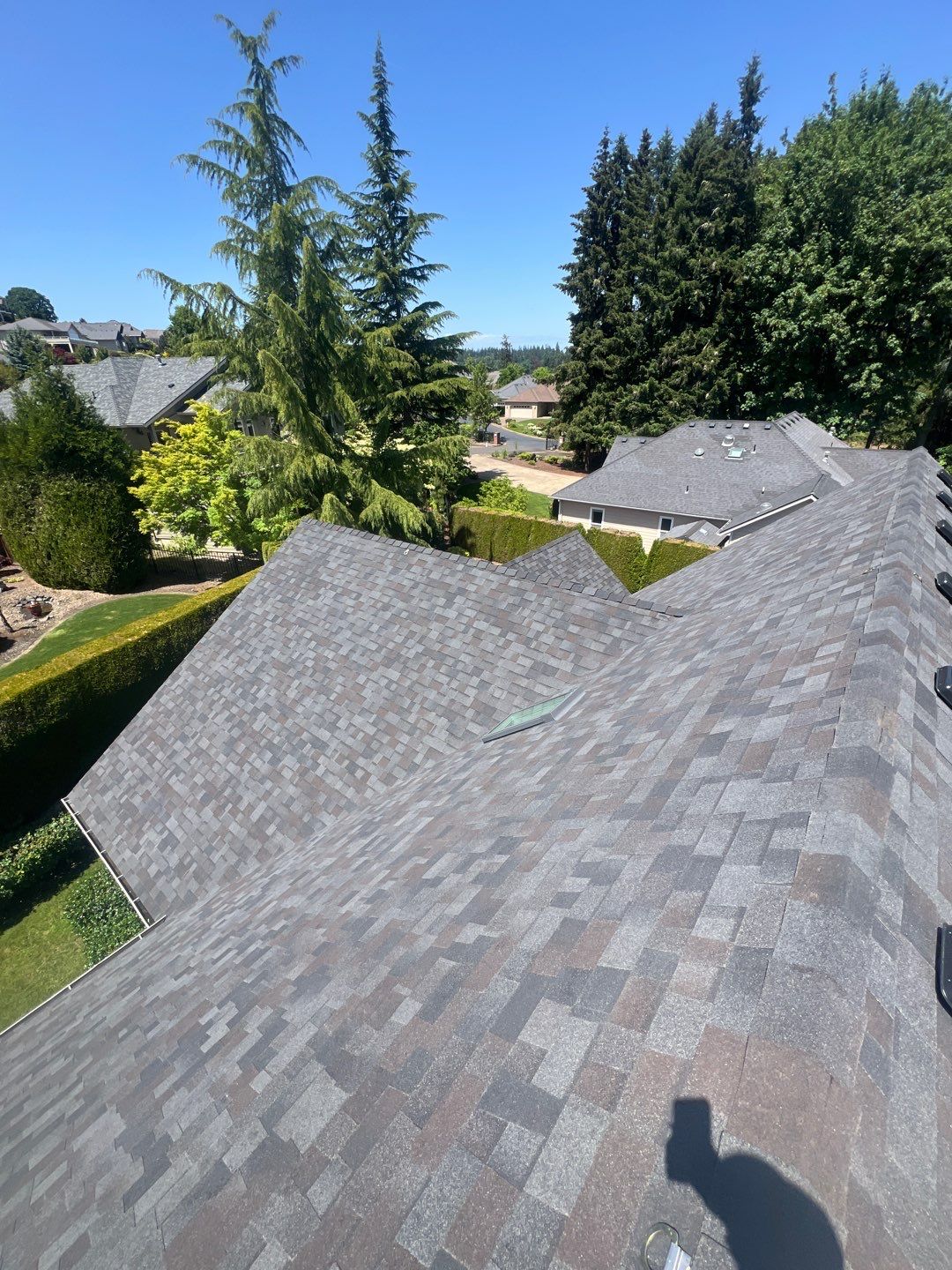 Residential Roofing Installation using Malarkey Vista (Color: Black Oak) by Orezona Building & Roofing Company, Inc.