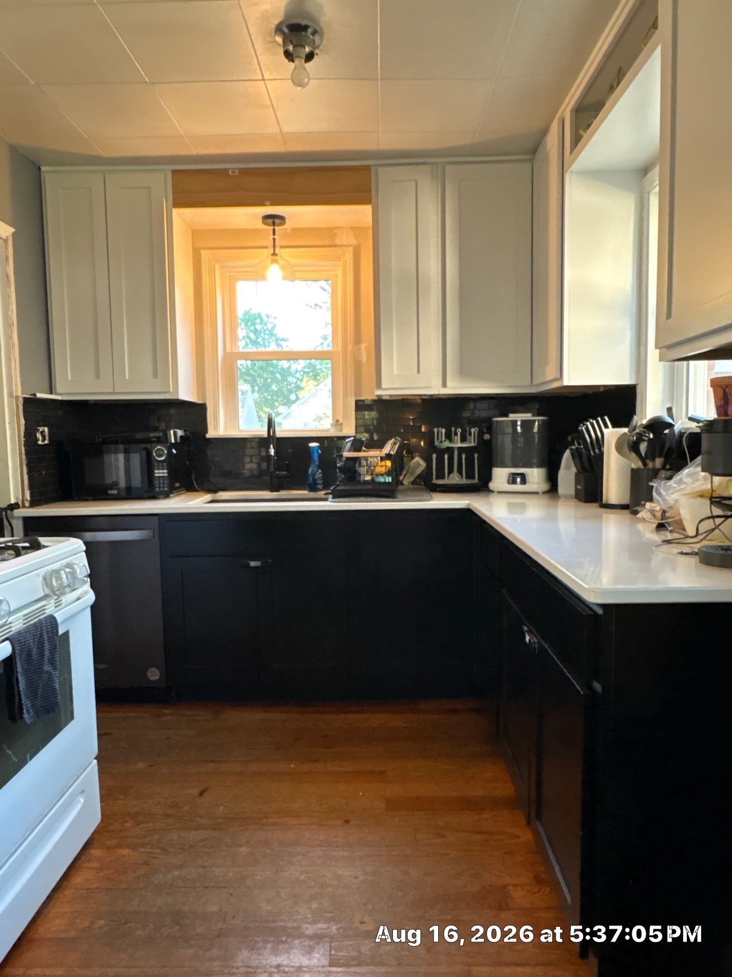 Modern Two-Tone Kitchen Remodel With Quartz Countertops in Lincoln by CompanyCam Sales Demo
