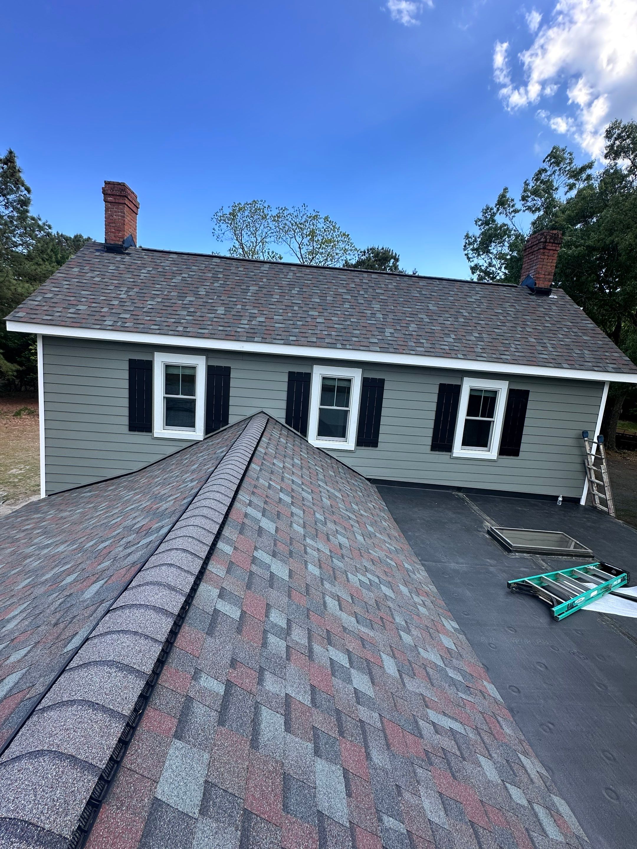 Waterfront Exterior Renovation in Port Haywood by Cade Construction