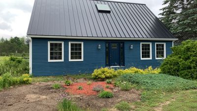 Residential Roofing Installation using 24 Ga Standing Seam Metal 