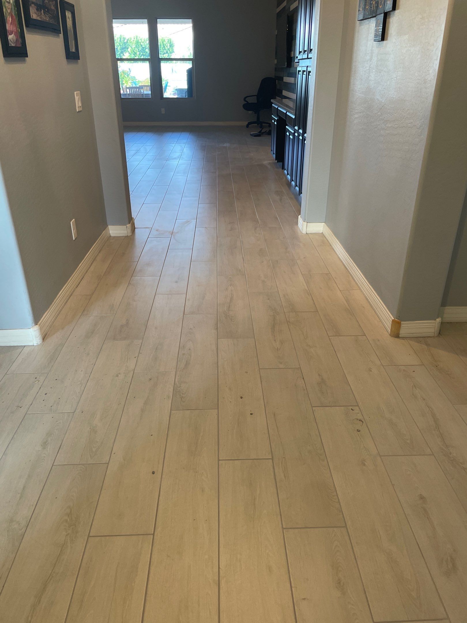 Wood Look Tile Floors and an Extra Large Shower  by Footprints Floors of Chandler 