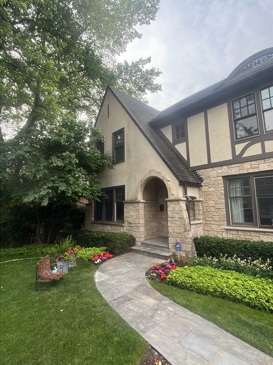 Northbrook, IL stucco home soft wash and stone cleaning by Northern Power Washing LLC.