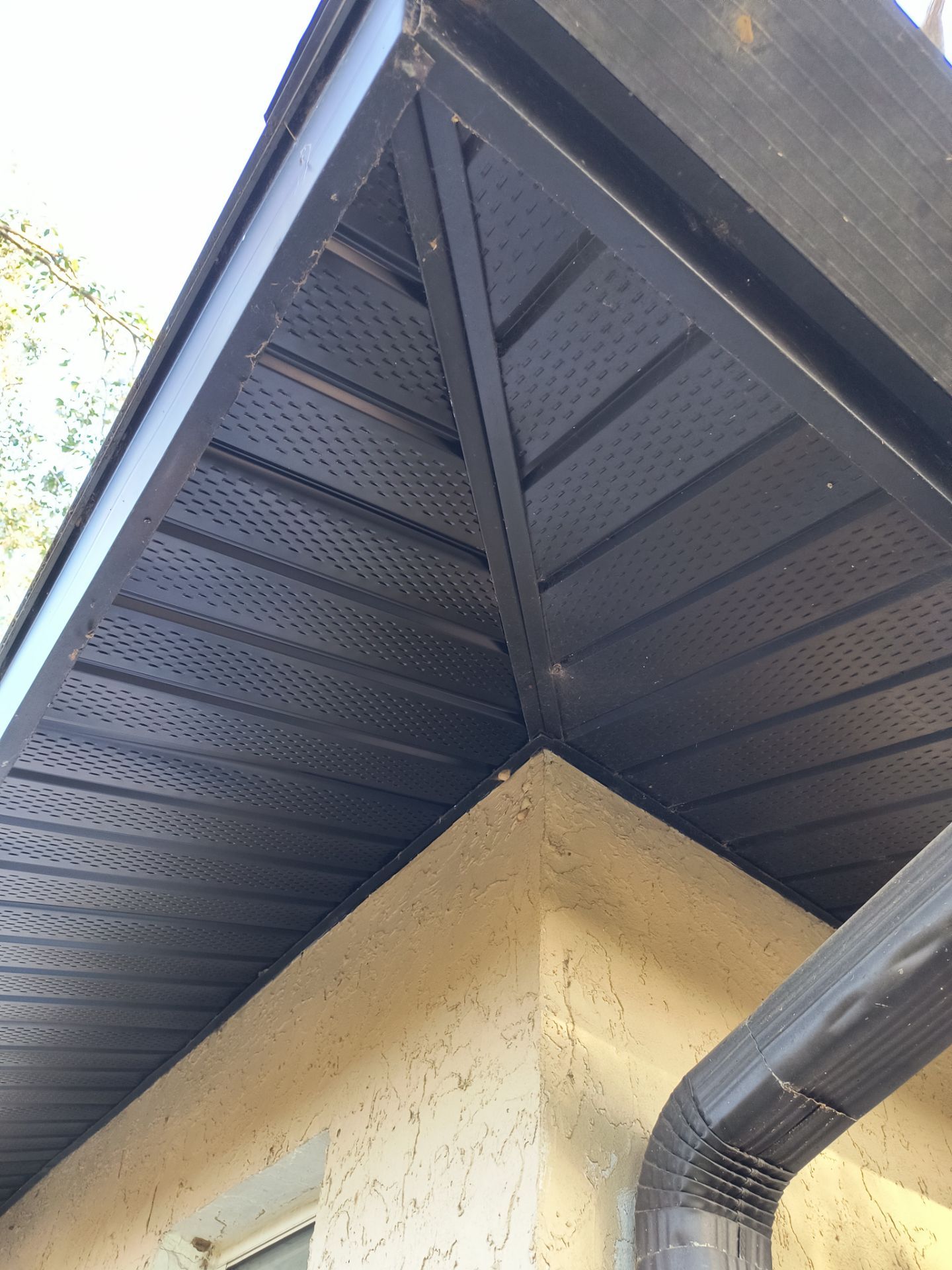 Gutter Repair Service in Sarasota FL - Black Soffit by Gutter Professors