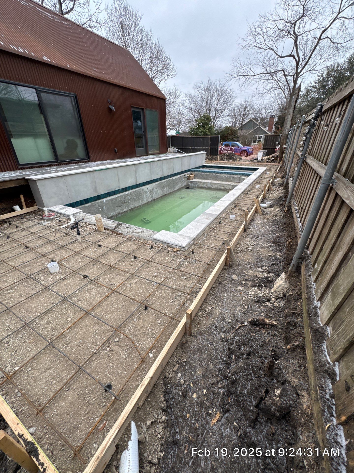 Modern Pool with Fire Wall by Pinnacle Pools and Spas - DFW