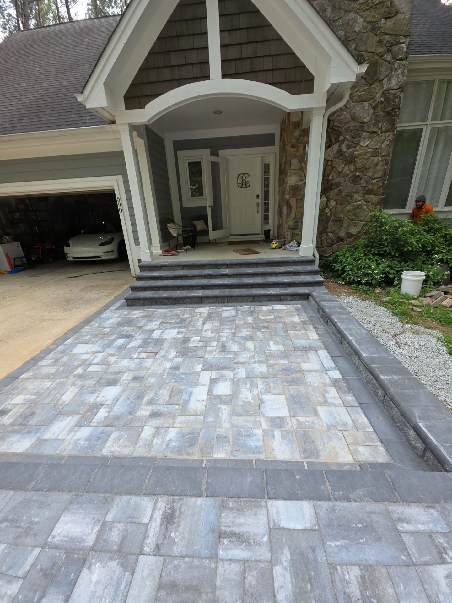 Pittsboro Outdoor Living Transformation – Retaining Wall, Paver Patio & Elevated Deck by Elite Remodeling and Design LLC