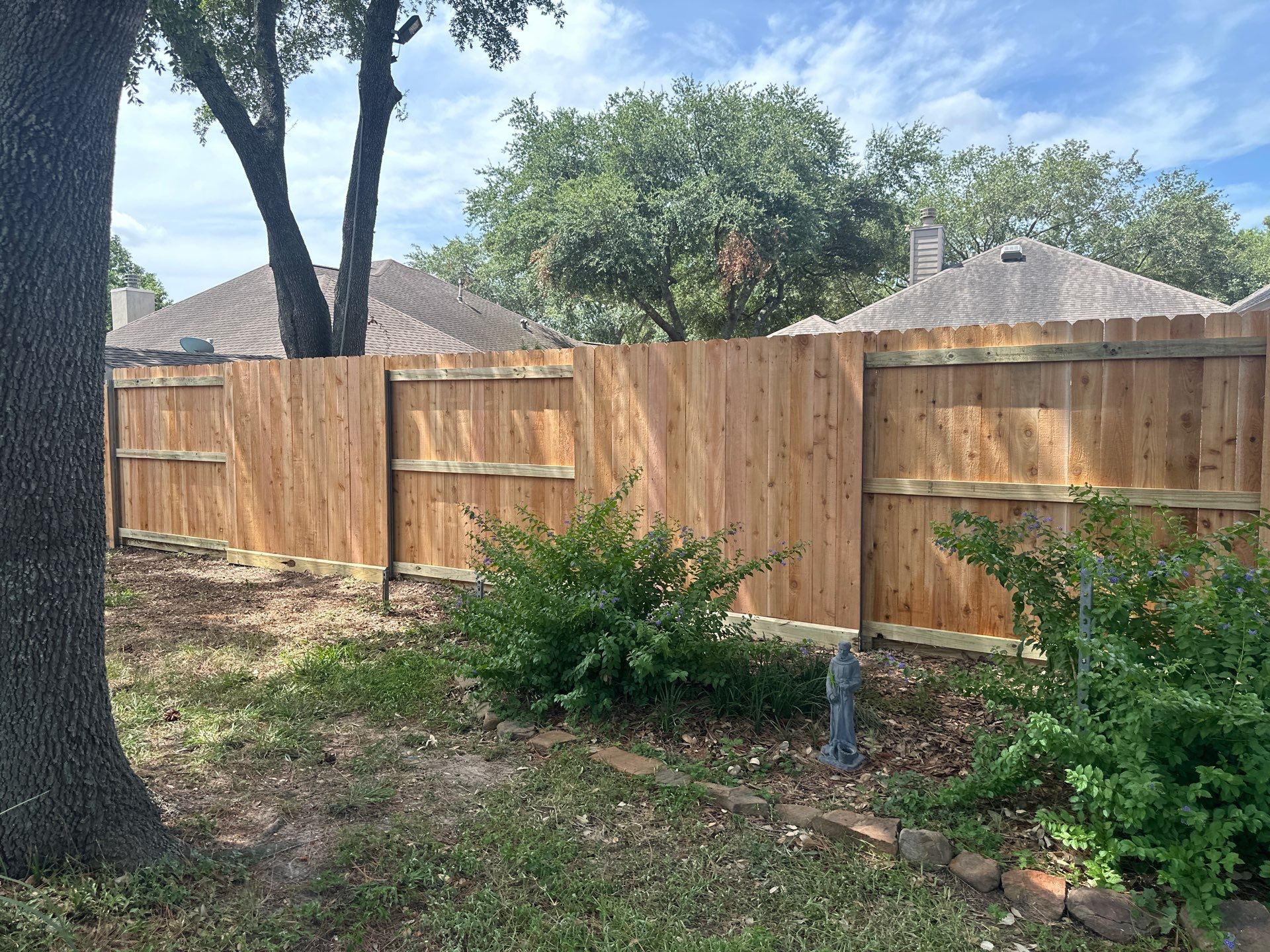 Wood fence project in Cypress by Tim's Fences