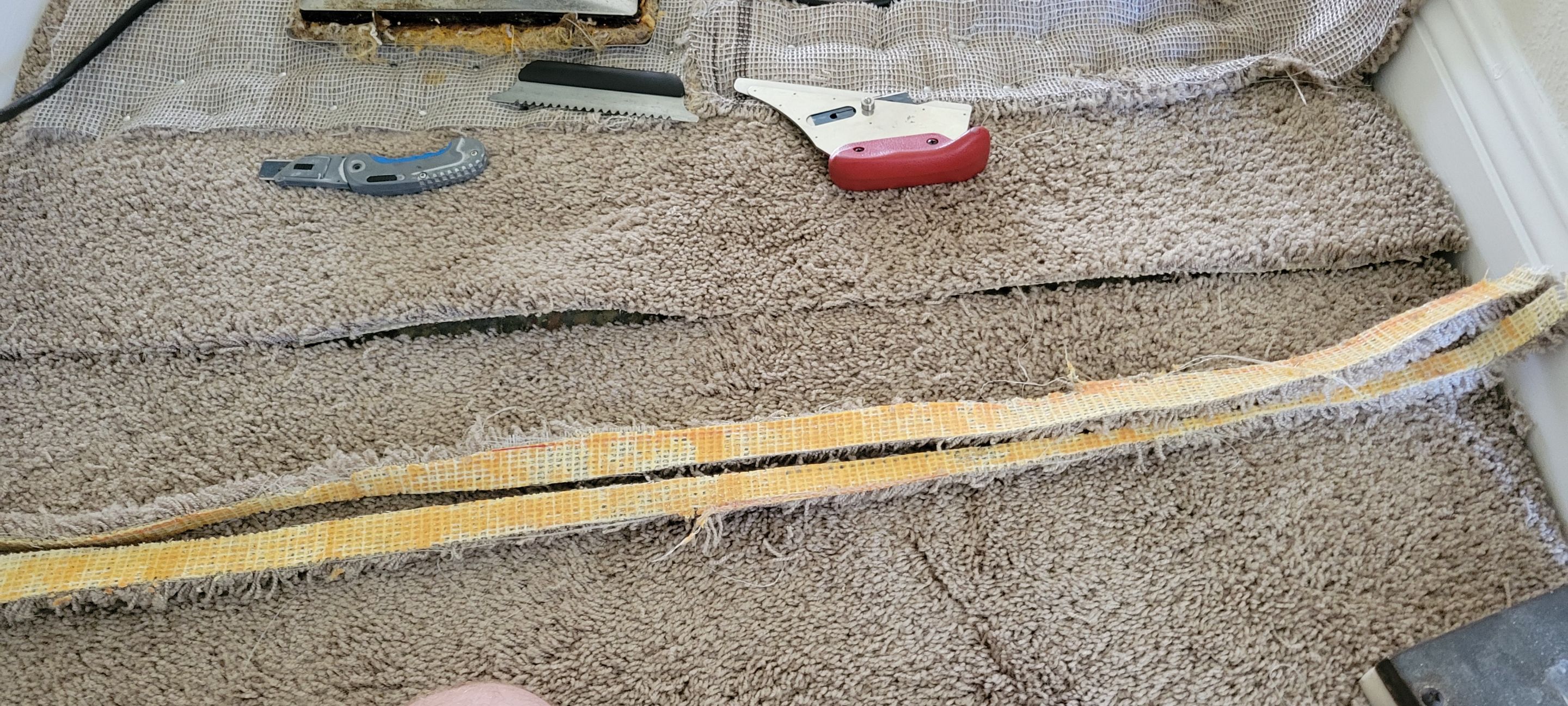 Stretching Hallway Carpet of a Rental by Ardent Carpet Restore LLC