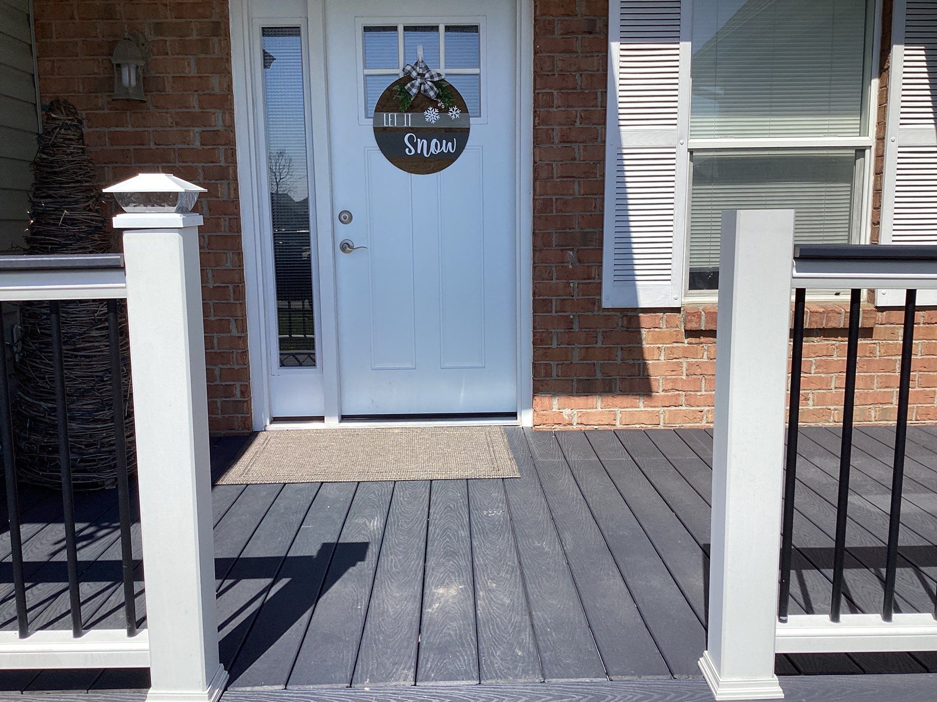 Exterior Installation using Onyx Black Durations and White Siding by WIW Enterprises Inc