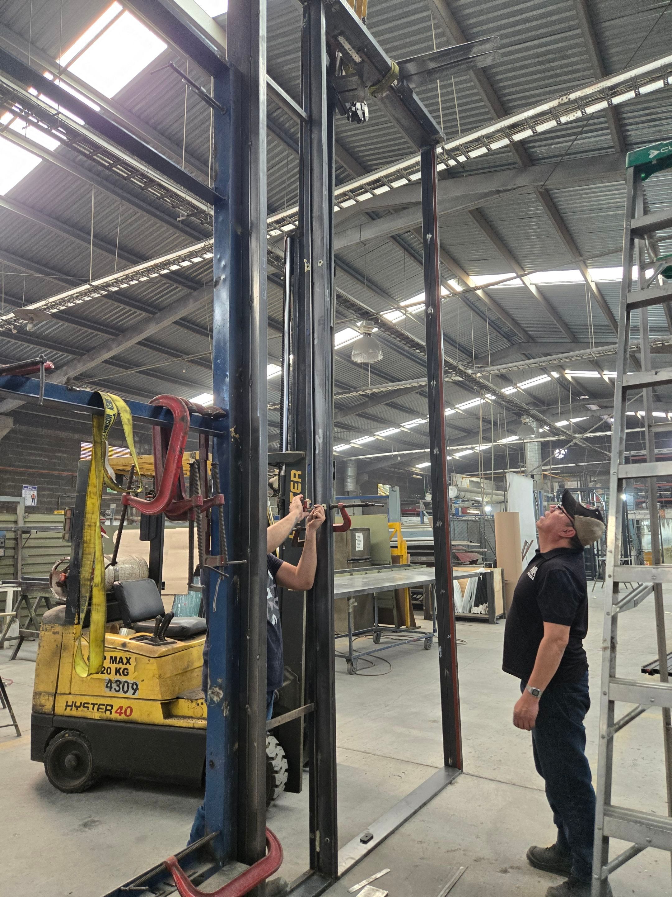 Custom Pivot Door and Structural Steel Frame Installation in Fort Worth by Solara Custom Living