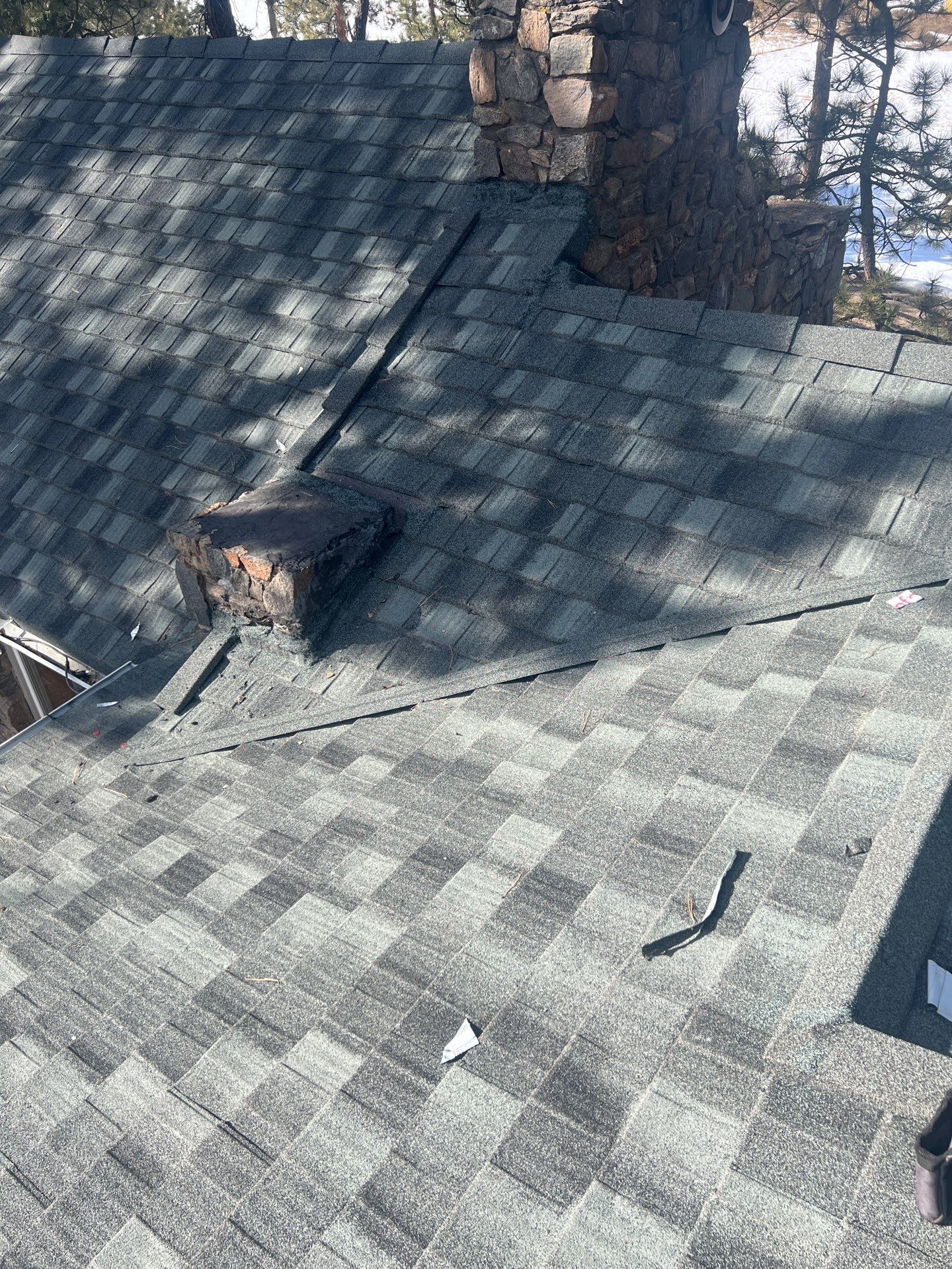Residential Roofing Installation using Stone Coated Steel by Blue Peaks Roofing LLC 