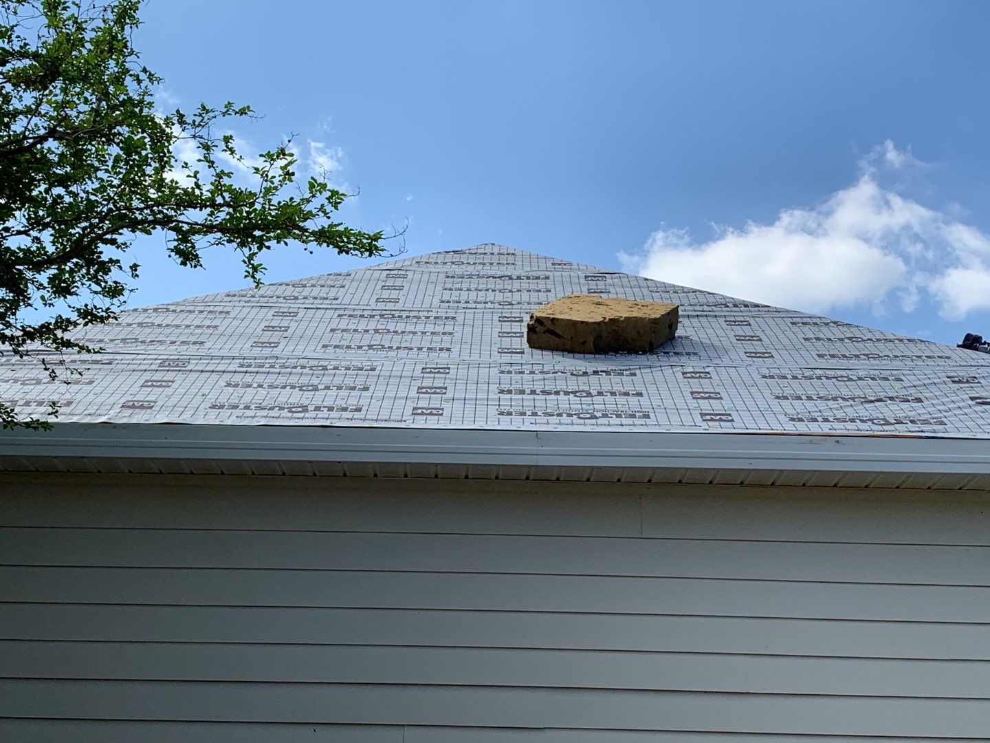 Residential Roofing Installation using Roof Replacement by American Roofing & Construction LLC