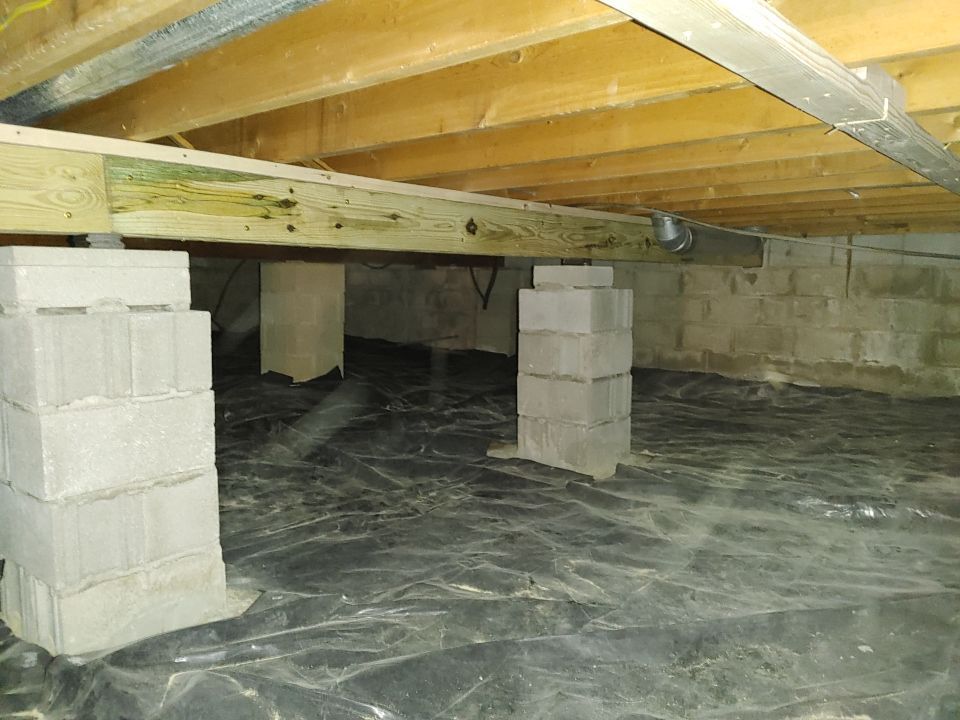 Crawl space encapsulation and Waterproofing using Structural Wood and Steel Reinforcements by Toledo Basement Repair 