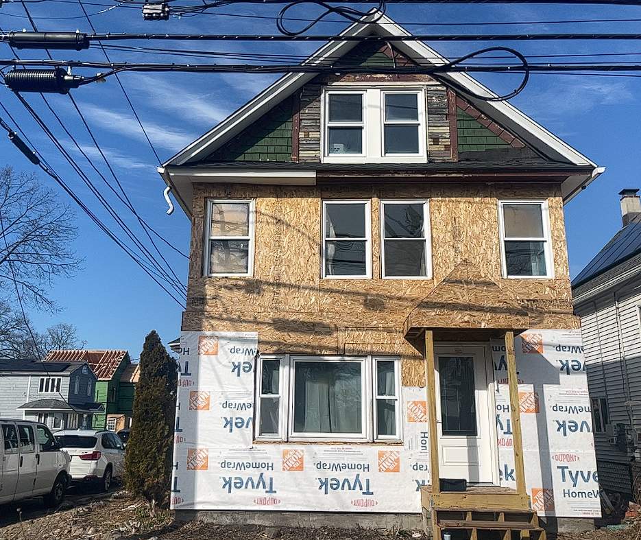 Siding Installation using Hardie Plank Aged Pewter by A Plus Exterior