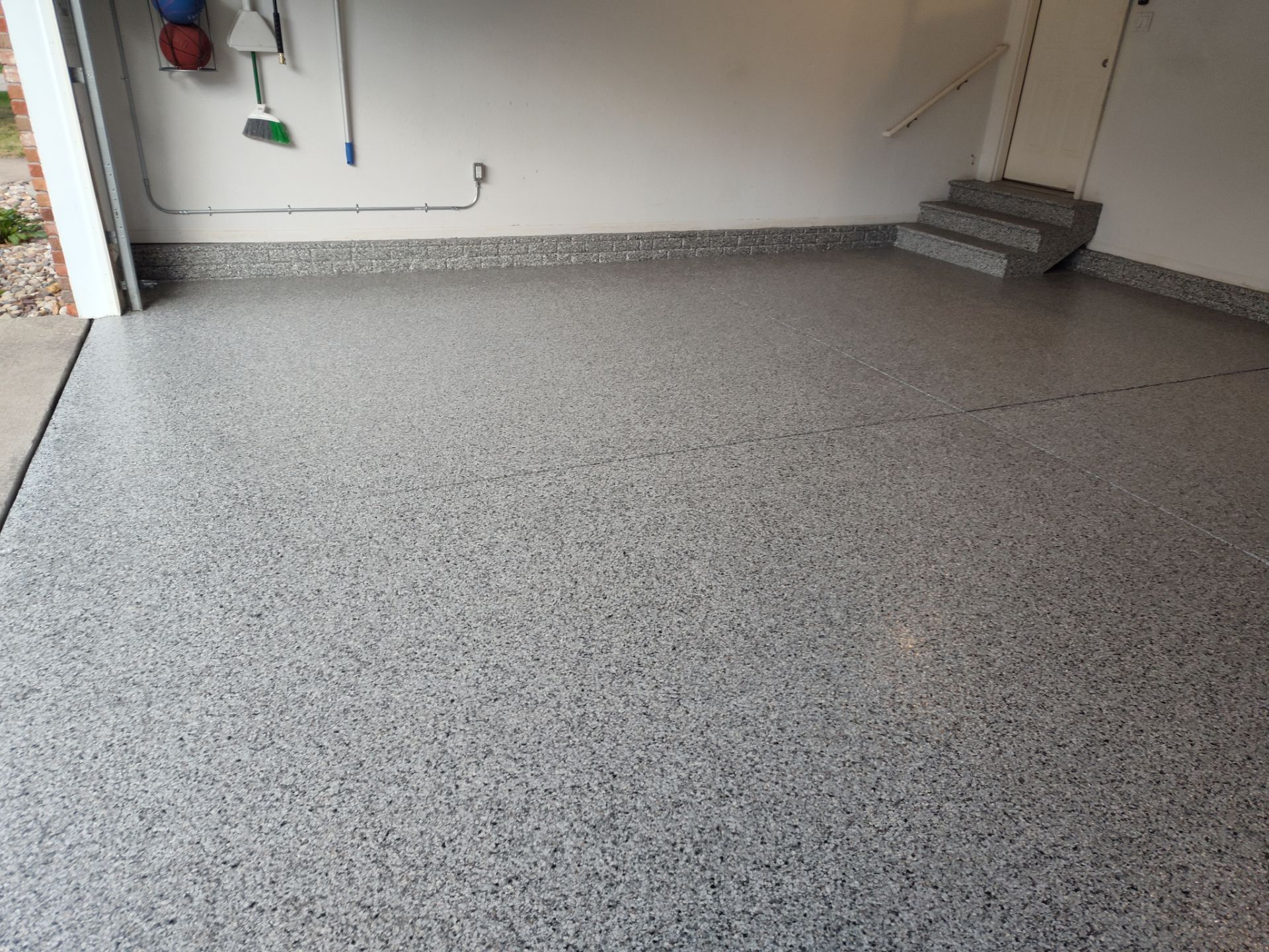 A Garage In One Day Keeps the Rock Salt Away! by Revival Concrete Coatings
